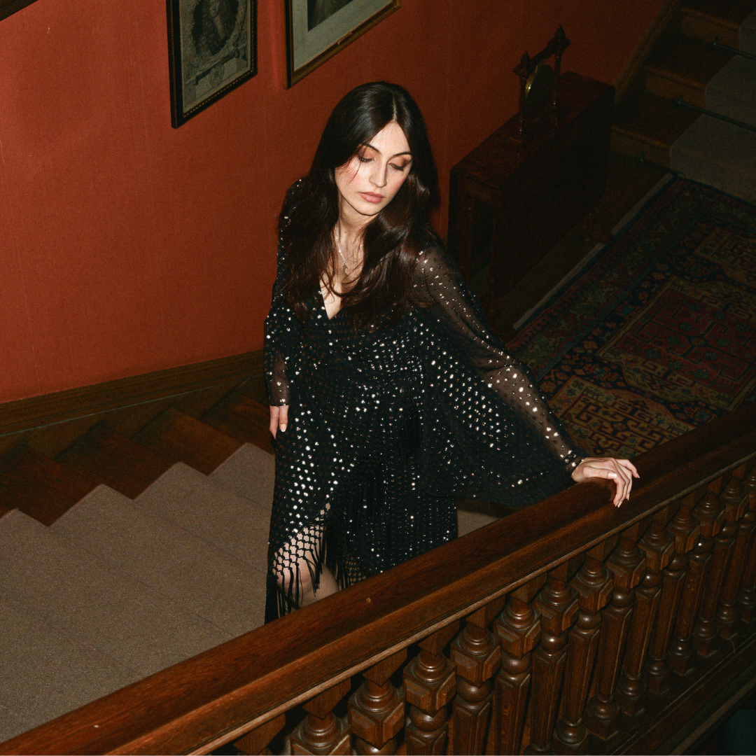 Model wearing Cosmic Dancer Metallic Wrap Dress on Party Collection shoot