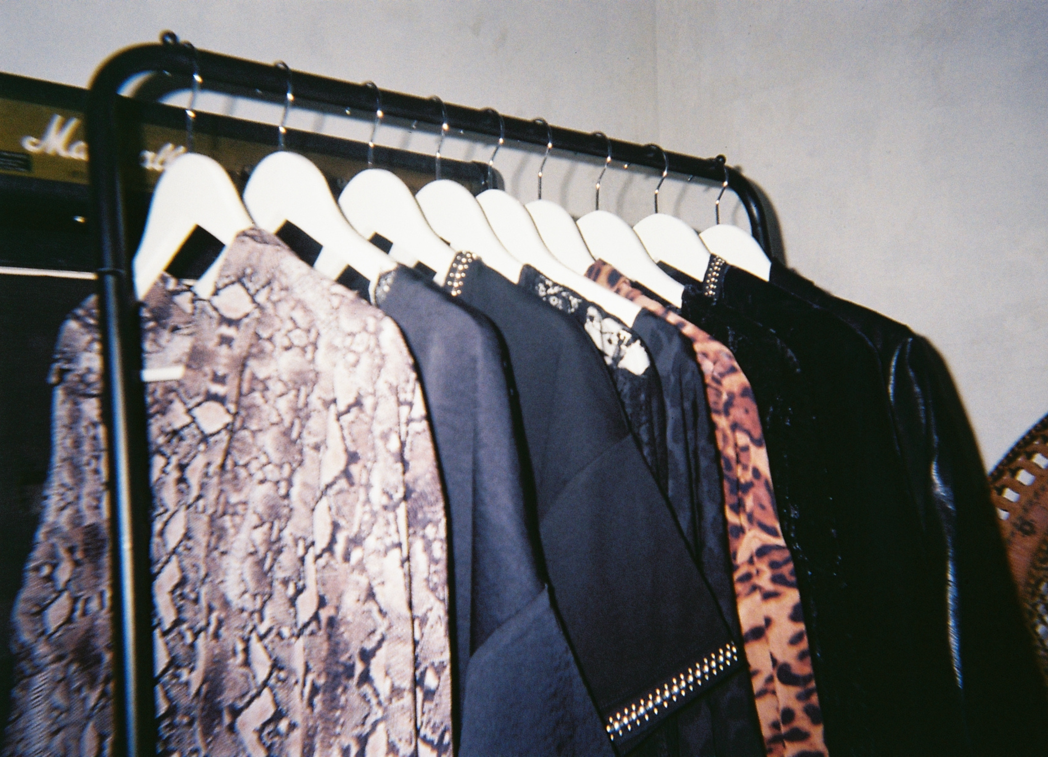 10 Pieces For 10 Years collection rail featuring: Mosshart Leopard and Snake Shirts, Ziggy Studded T-Shirt Dress, Rhiannon Lace Mini Dress