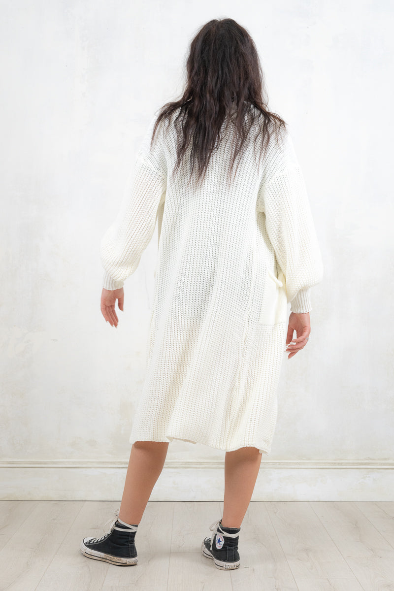Model wearing All Apologies Cream Cardigan - Cream oversized knit cardigan , Open front with true pockets