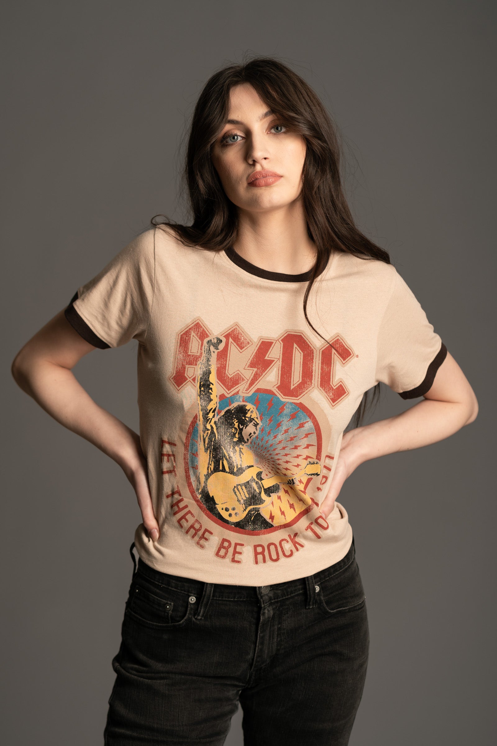 AC/DC '77 Tour Band Tee front model view on vintage wash sand base from Little Lies