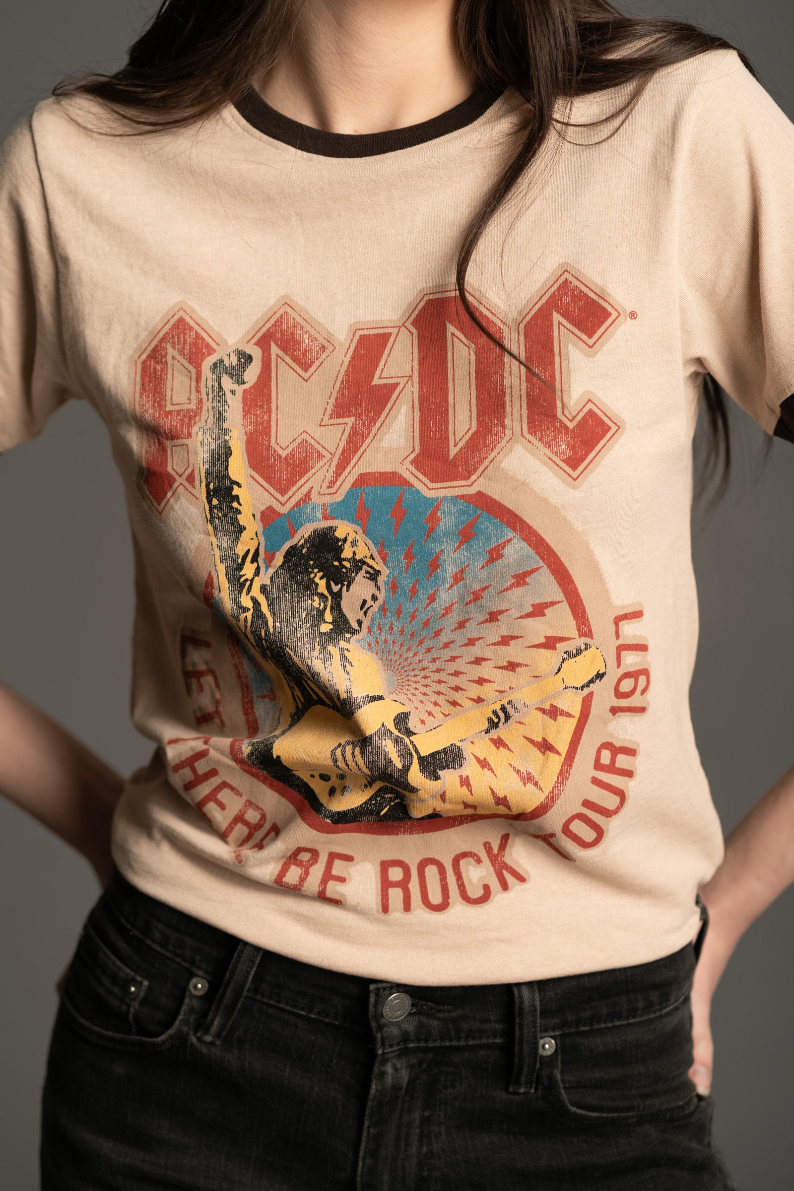 Close-up of Let There Be Rock Tour vintage graphic on AC/DC '77 Band Tee from Little Lies