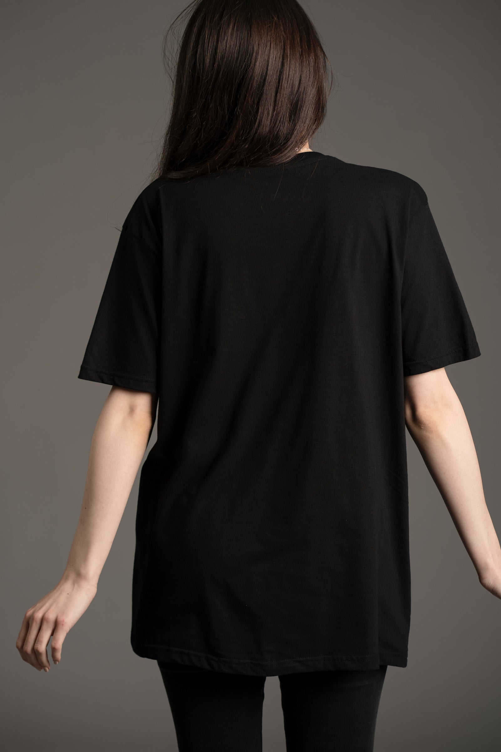 Plain black, back view of the Black Sabbath Dancing Band graphic tee in black, from Little Lies collection