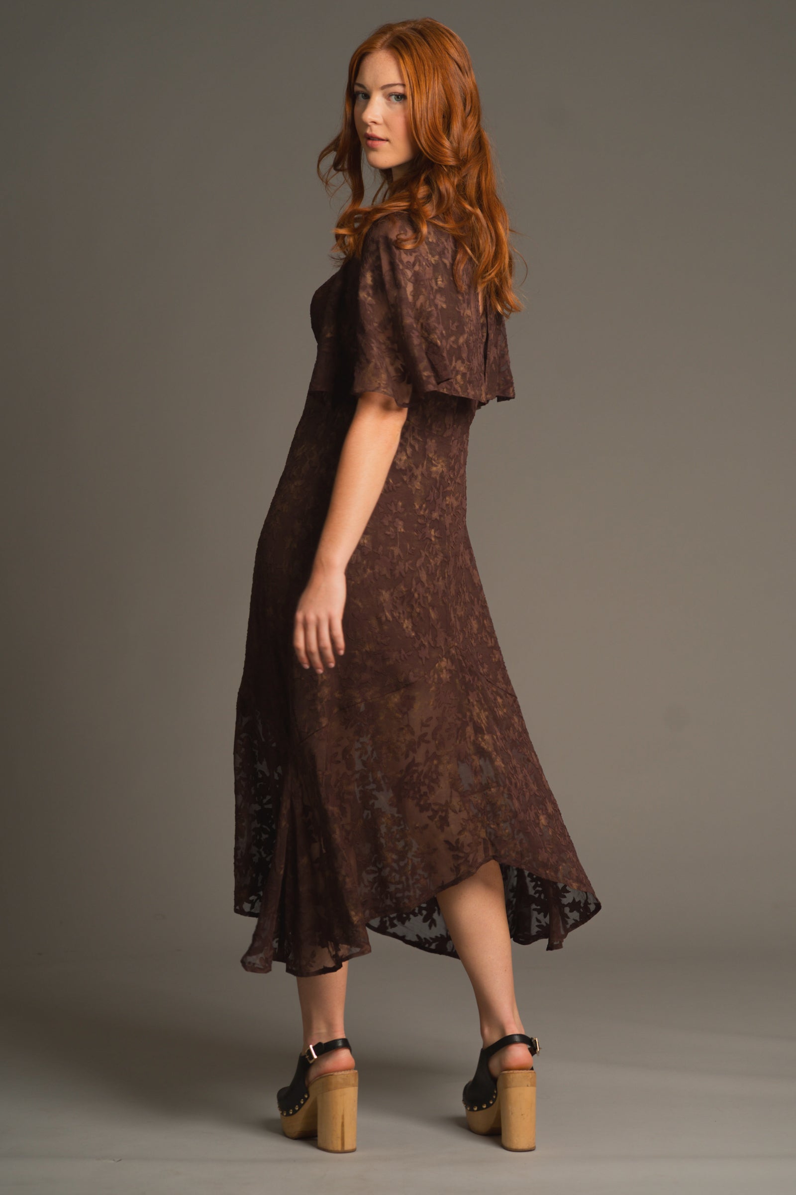 Anna showing the back of the Brown Sugar cape maxi chiffon dress, Stevie nicks inspired styling studio