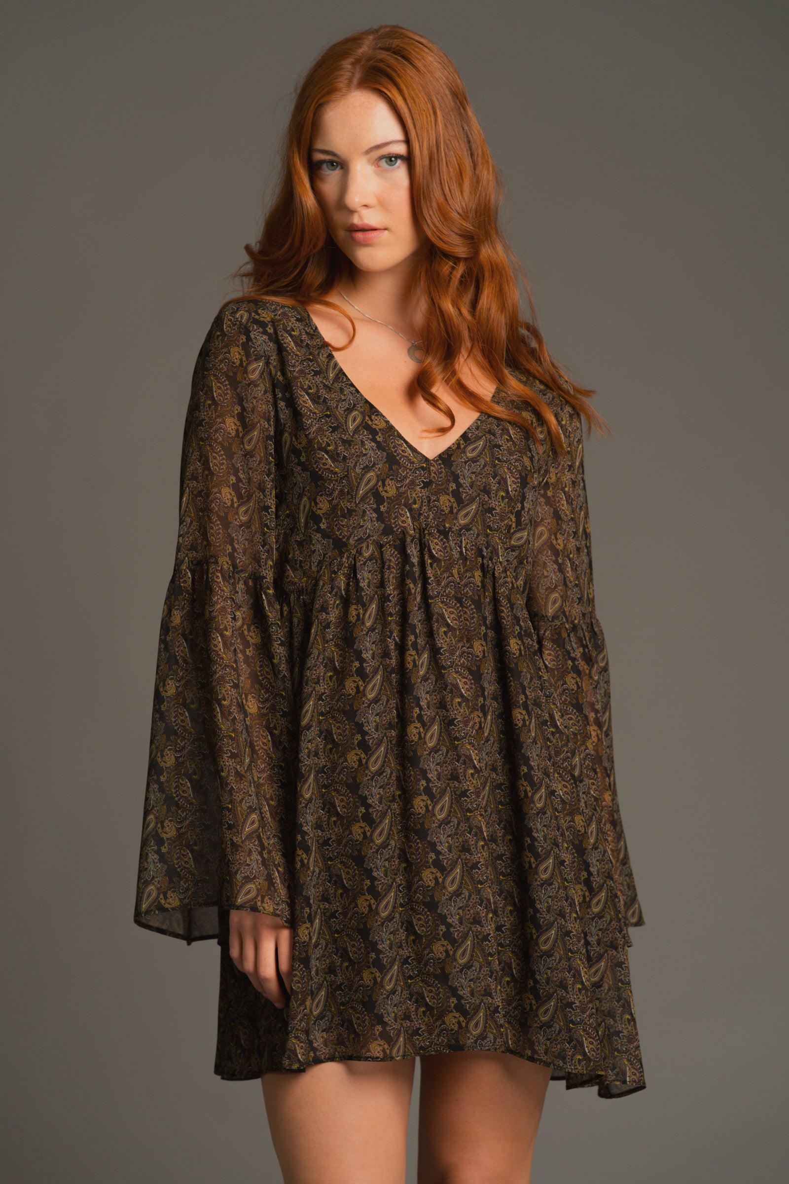 Cinnamon Girl Paisley Chiffon Smock Dress front view in deep neutrals with flared sleeves and relaxed mini fit