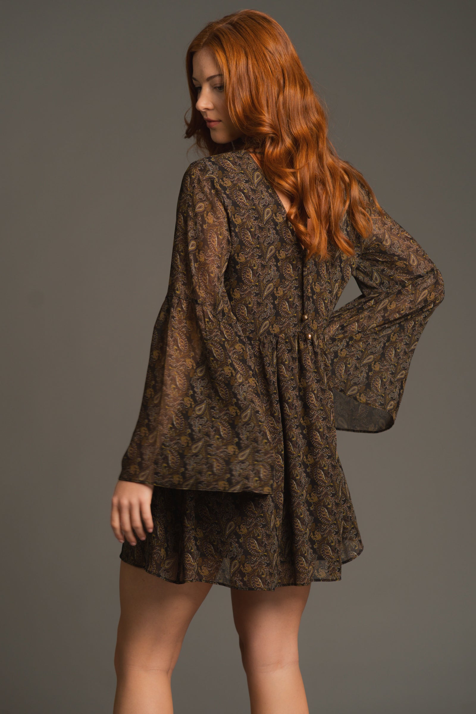 Side view of Cinnamon Girl Paisley Chiffon Smock Dress showing flowing smock silhouette and mini length