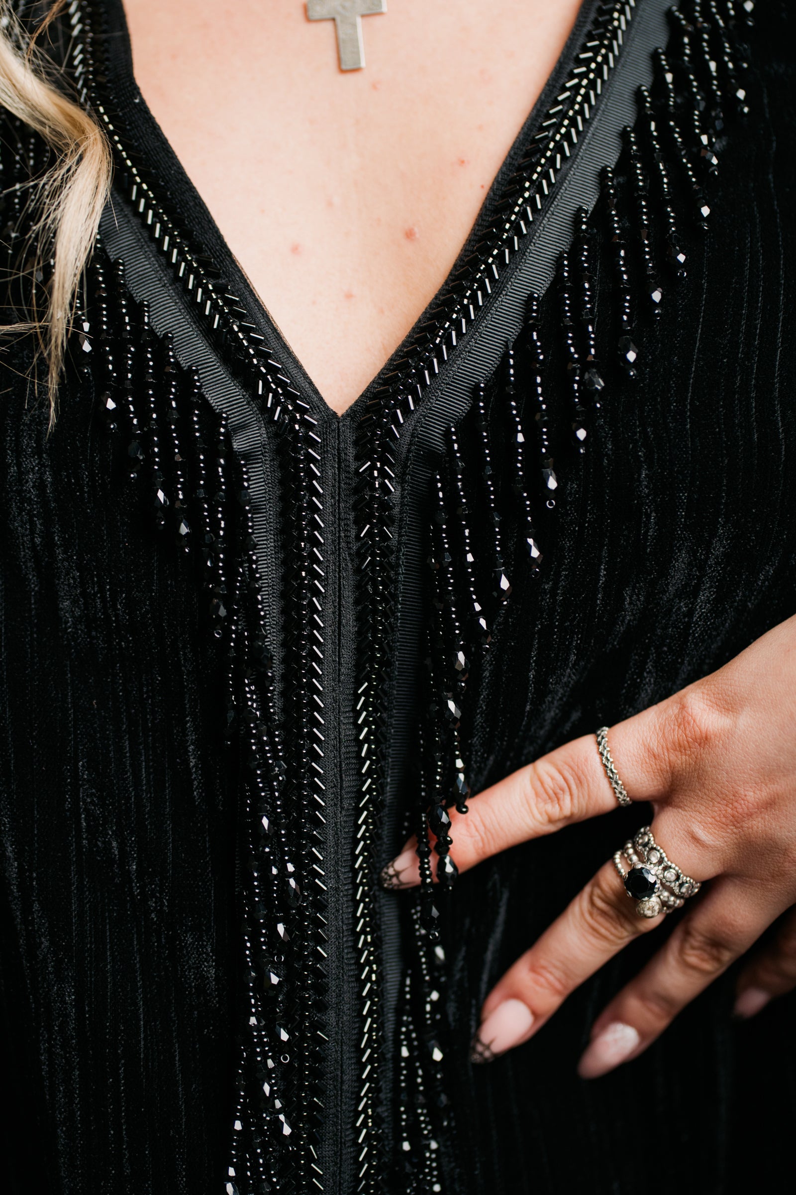 Back view of Little Lies Cosmic Love Beaded Shift Dress showing flared sleeves and textured velvet