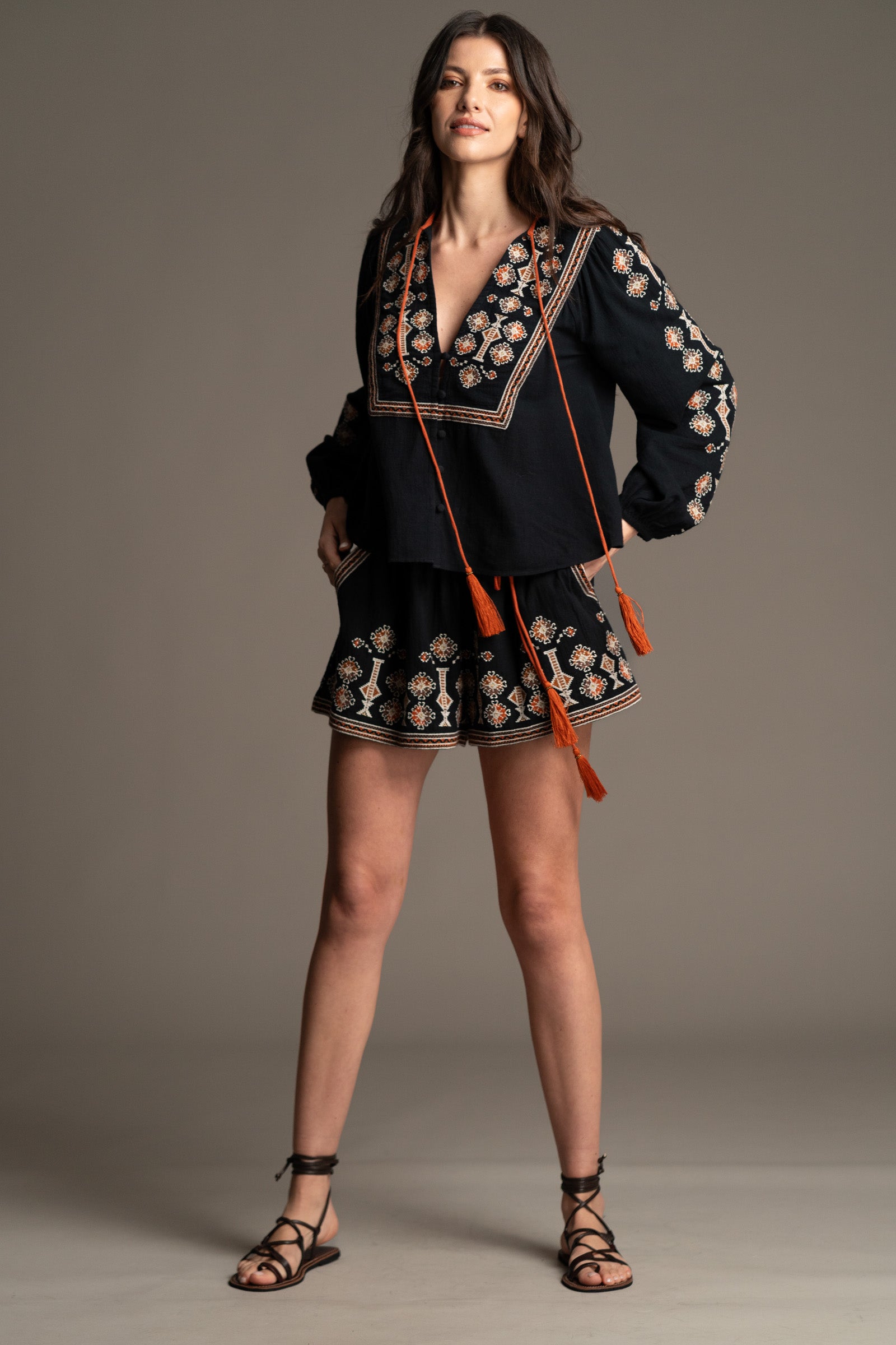 Ghost image of Little Lies Anita Embroidered Shorts showing embroidery detail and high-waisted silhouette
