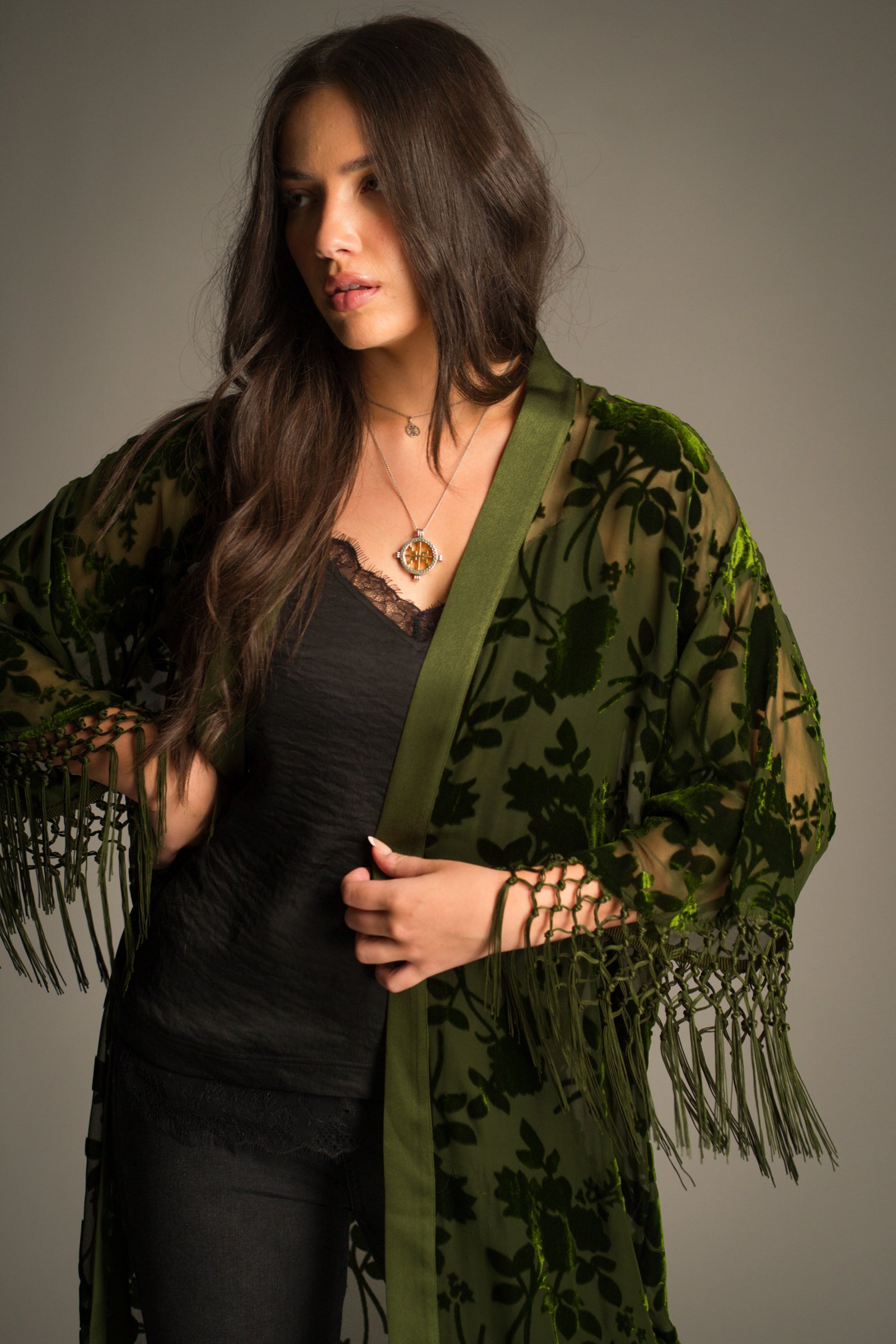 Close-up of Little Lies Dakota kimono neckline showing sheer olive devore fabric with soft velvet floral texture and satin trim