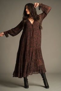 Full length view of the Dark Paradise Paisley Maxi Dress showing fluid maxi silhouette and sheer sleeves.