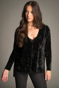 Close-up front view of the Dylan Black Crushed Velvet Tee showing V-neckline and velvet texture.