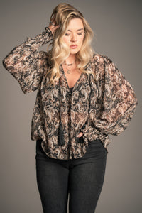 Little Lies Eleanor paisley smock top with relaxed fit, button front and tassel tie neckline in black and neutral paisley print