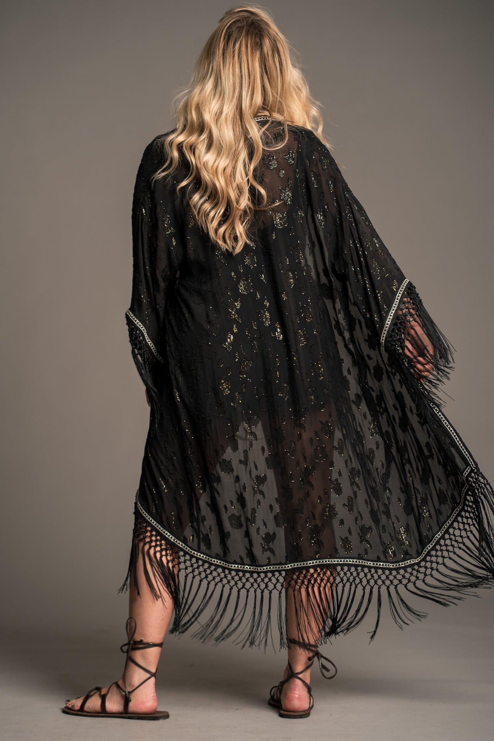Electric Lady Kimono open, showing wide sleeves and fringe detailing