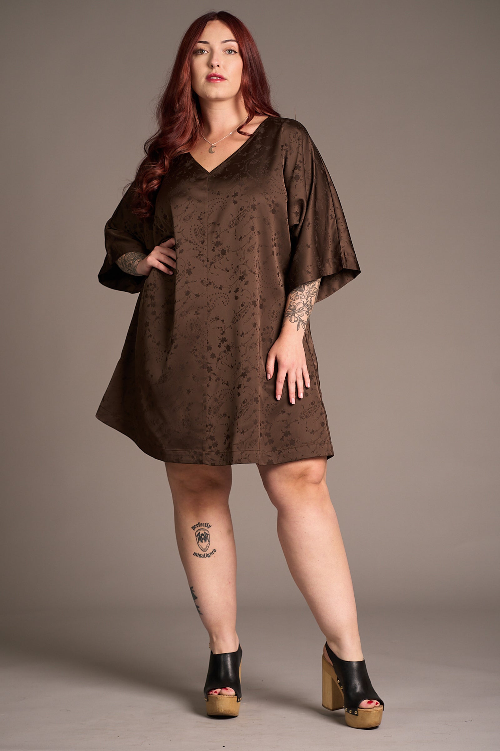 Taylor wearing the Evermore Espresso Batwing Mini Dress, unbelted to show relaxed fit. Stevie Nicks inspired styling studio.