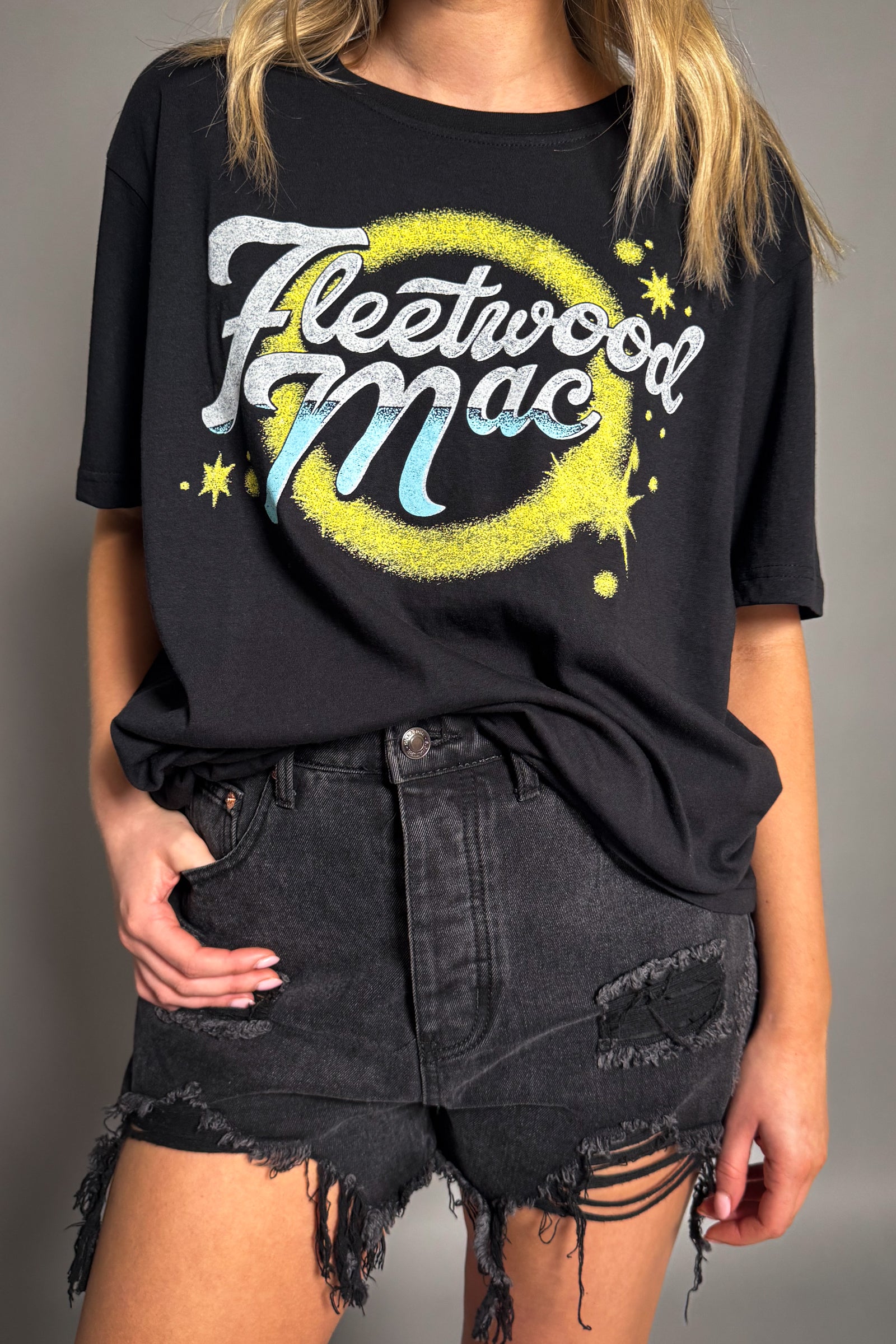 Front view of the Fleetwood Mac Circle Logo band t-shirt in black.