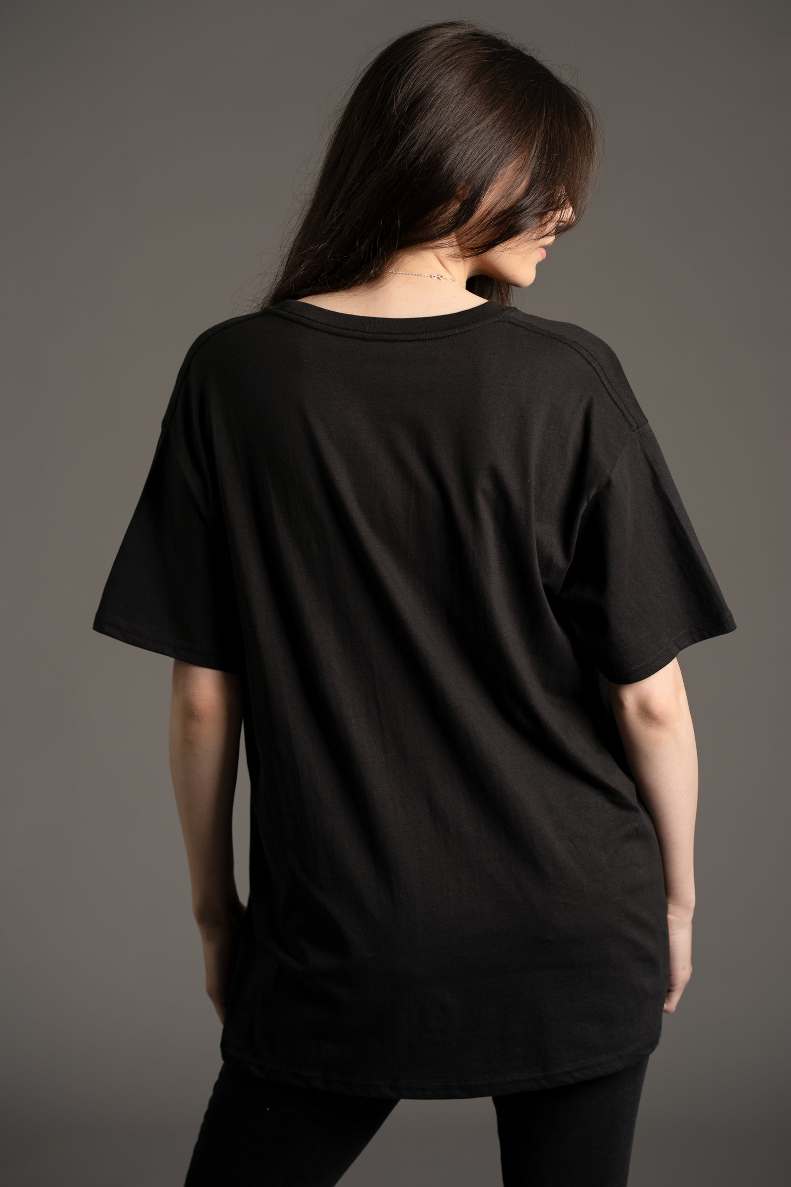 Plain black, back view of the Fleetwood Mac Sisters of the Moon Band graphic tee from Little Lies collection