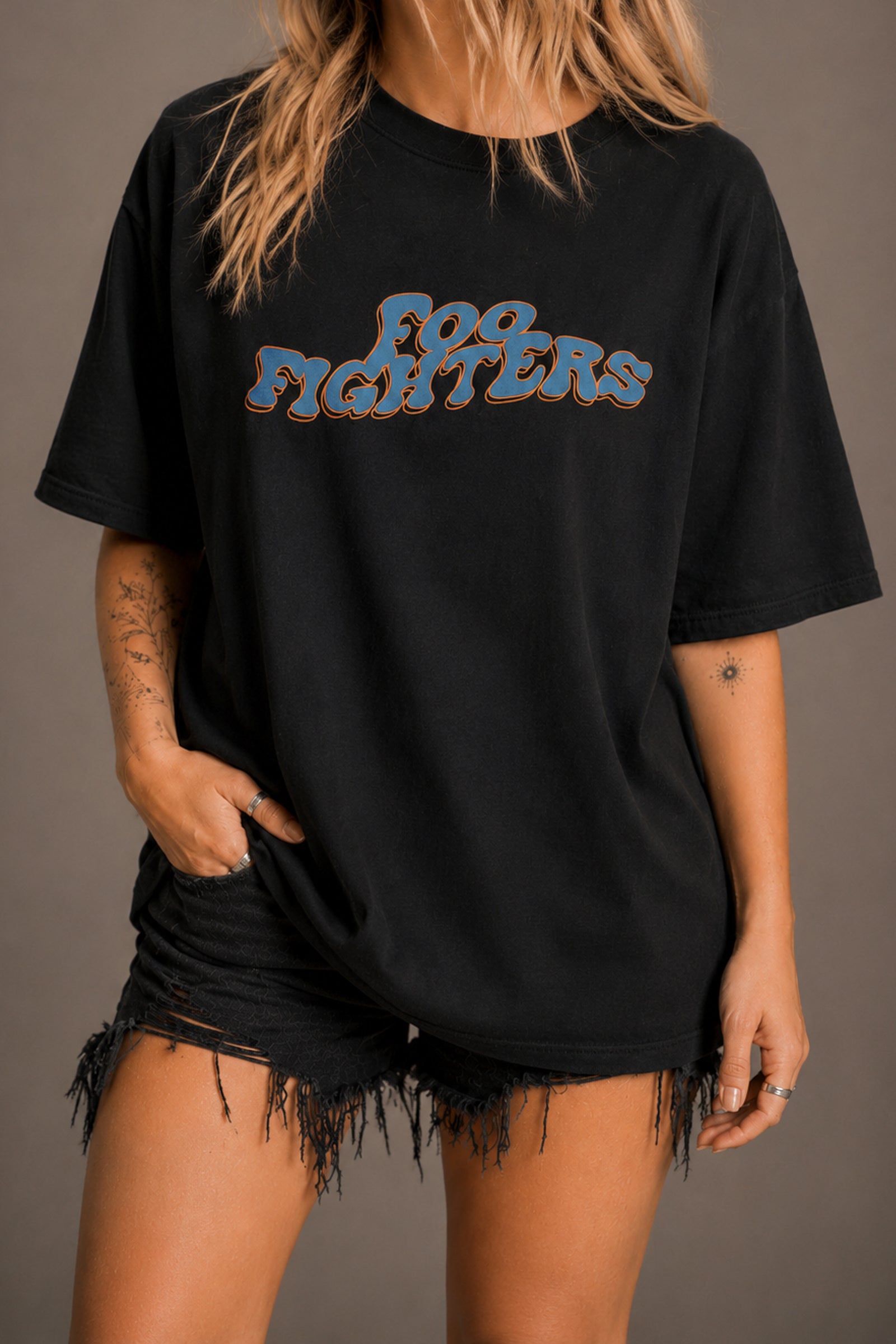 Little Lies Foo Fighters graphic t-shirt in black featuring retro logo design