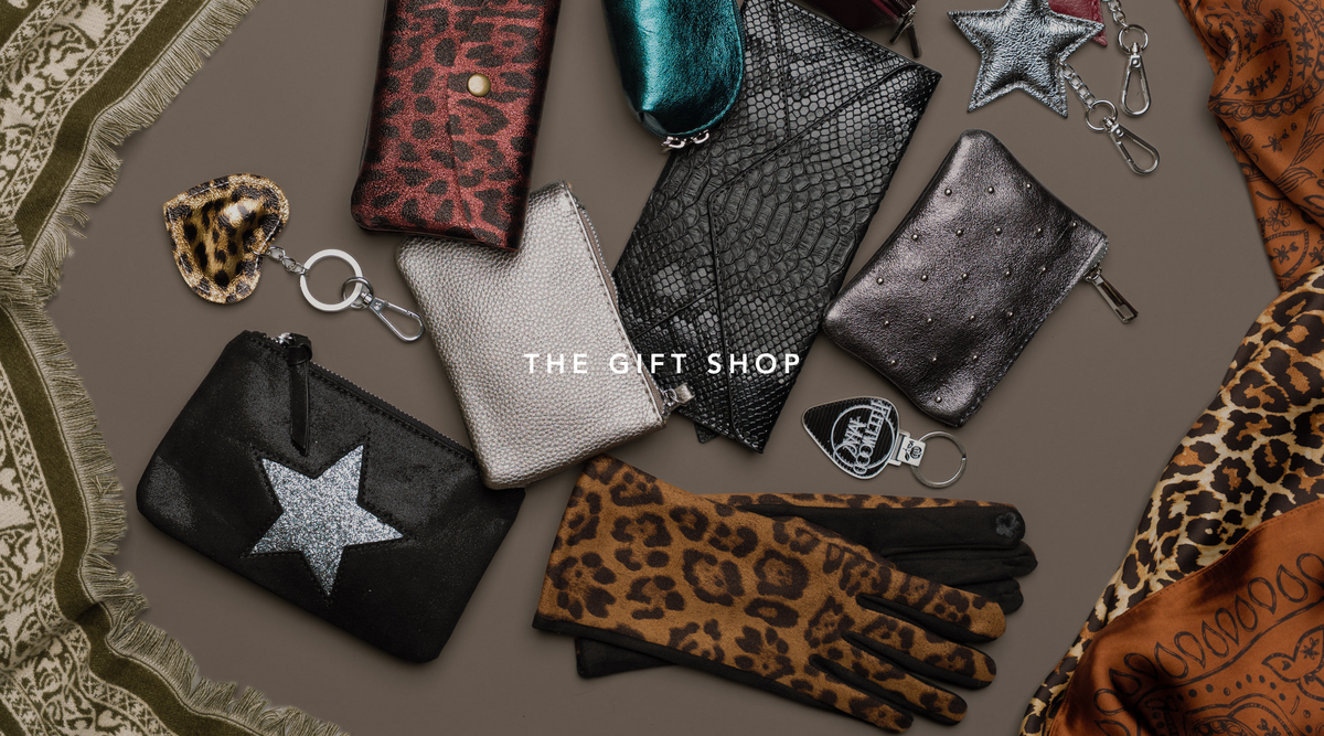 Little Lies accessories collection featuring metallic purses, leather gloves, bag charms and animal print accessories