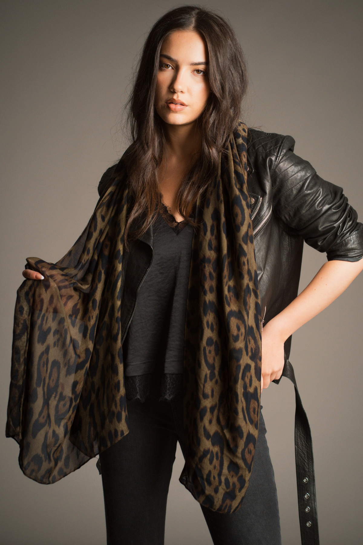 Khaki leopard scarf by Little Lies styled with a black leather biker jacket for a relaxed boho rock look
