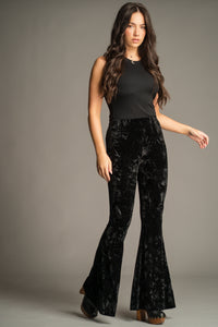 Front view of the Hendrix Black Crushed Velvet Flares in lustrous black velvet.
