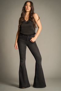 Hendrix Denim Flares in washed black featuring a high-rise waist, fitted leg and statement flared silhouette