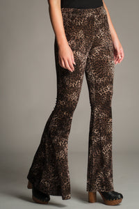 Close-up front view of the Hendrix Leopard Velvet Flares showing velvet texture and high-waist fit.