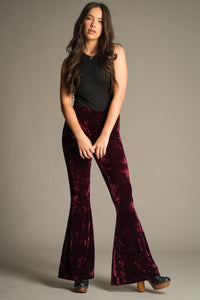 Front view of the Hendrix Merlot Crushed Velvet Flares in rich merlot velvet.