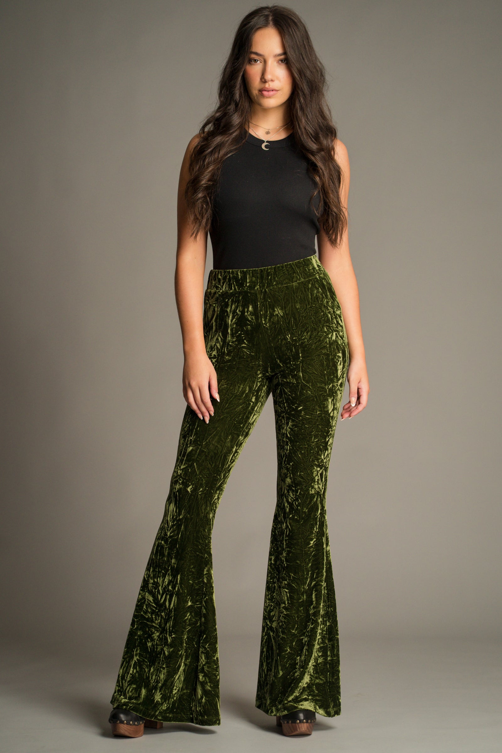 Side view of the Hendrix Olive Crushed Velvet Flares showing bell-bottom silhouette.
