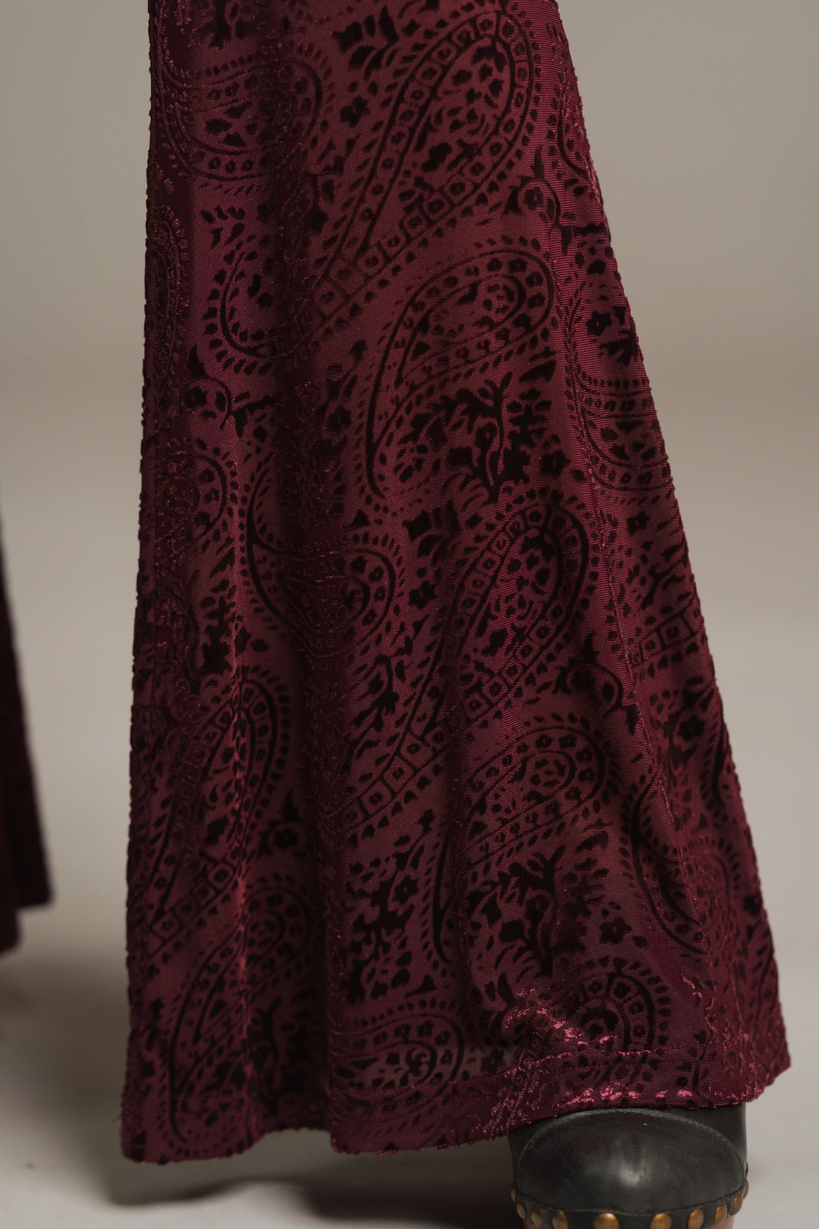 Detail shot of Hendrix plum devore flares, showing the wide flare.