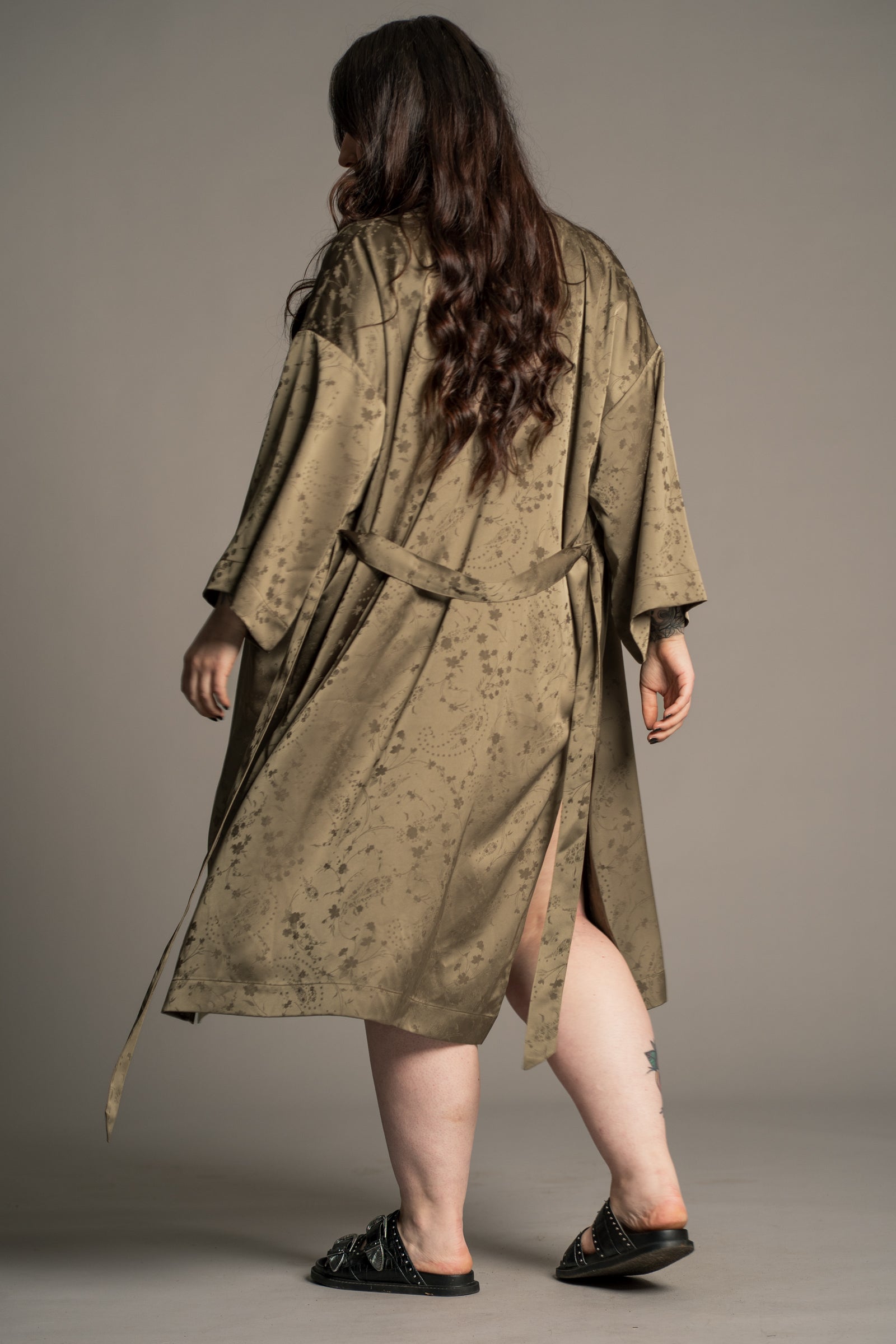 Little Lies Iris satin kimono in olive tone with subtle floral texture and tie waist, relaxed silhouette, on‑model back view