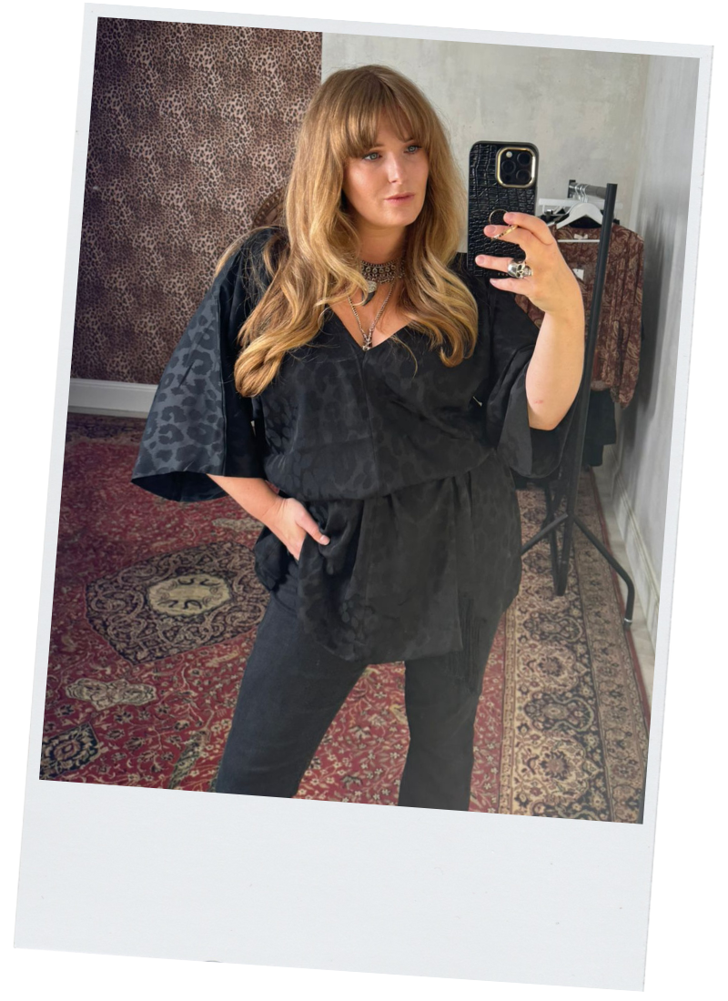 Little Lies founder Jade in her Sweet Emotion Batwing Dress styled belted up over Jeans.
