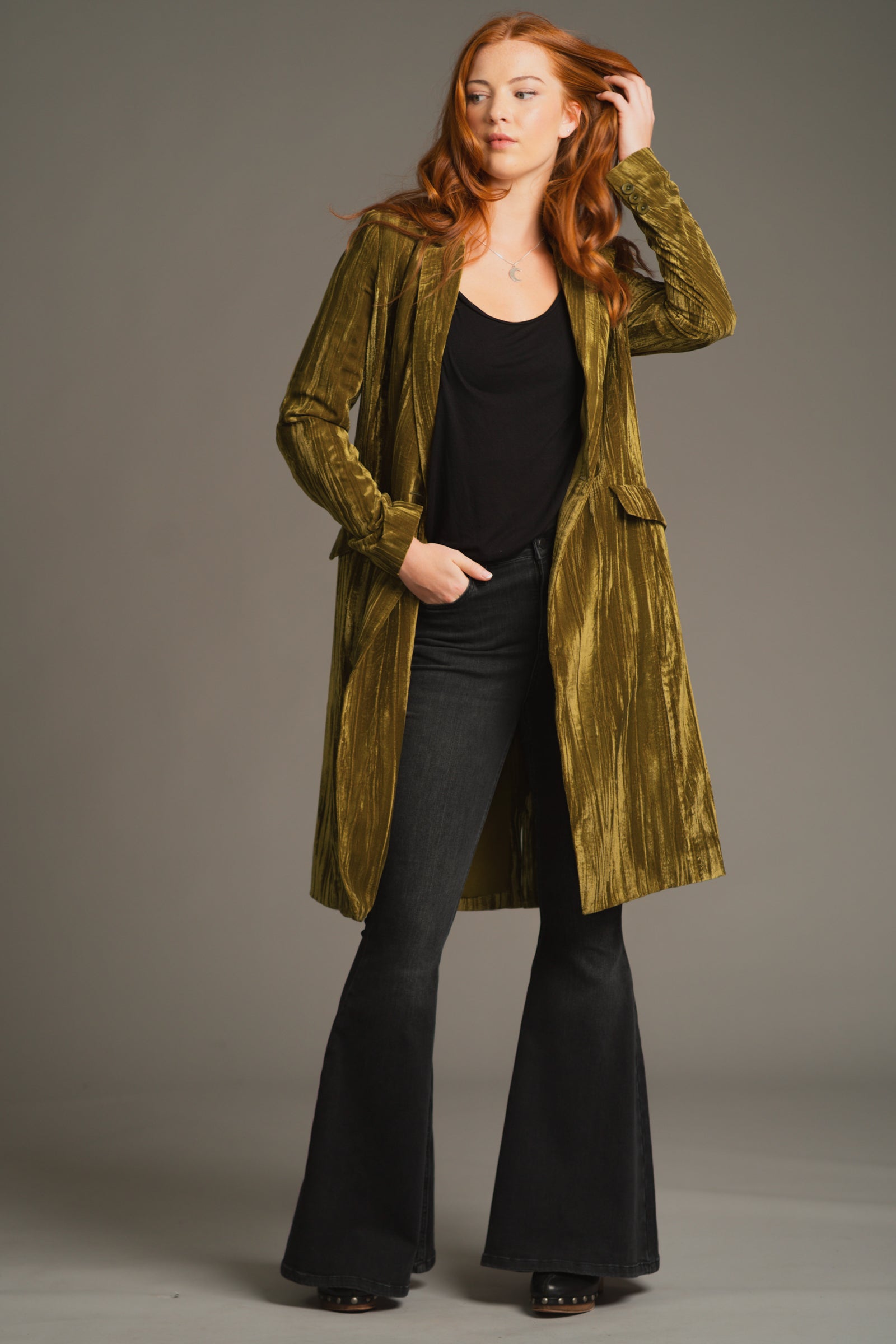Model posing with hands in pockets, showcasing laid-back tailored fit of the Jagger jacket