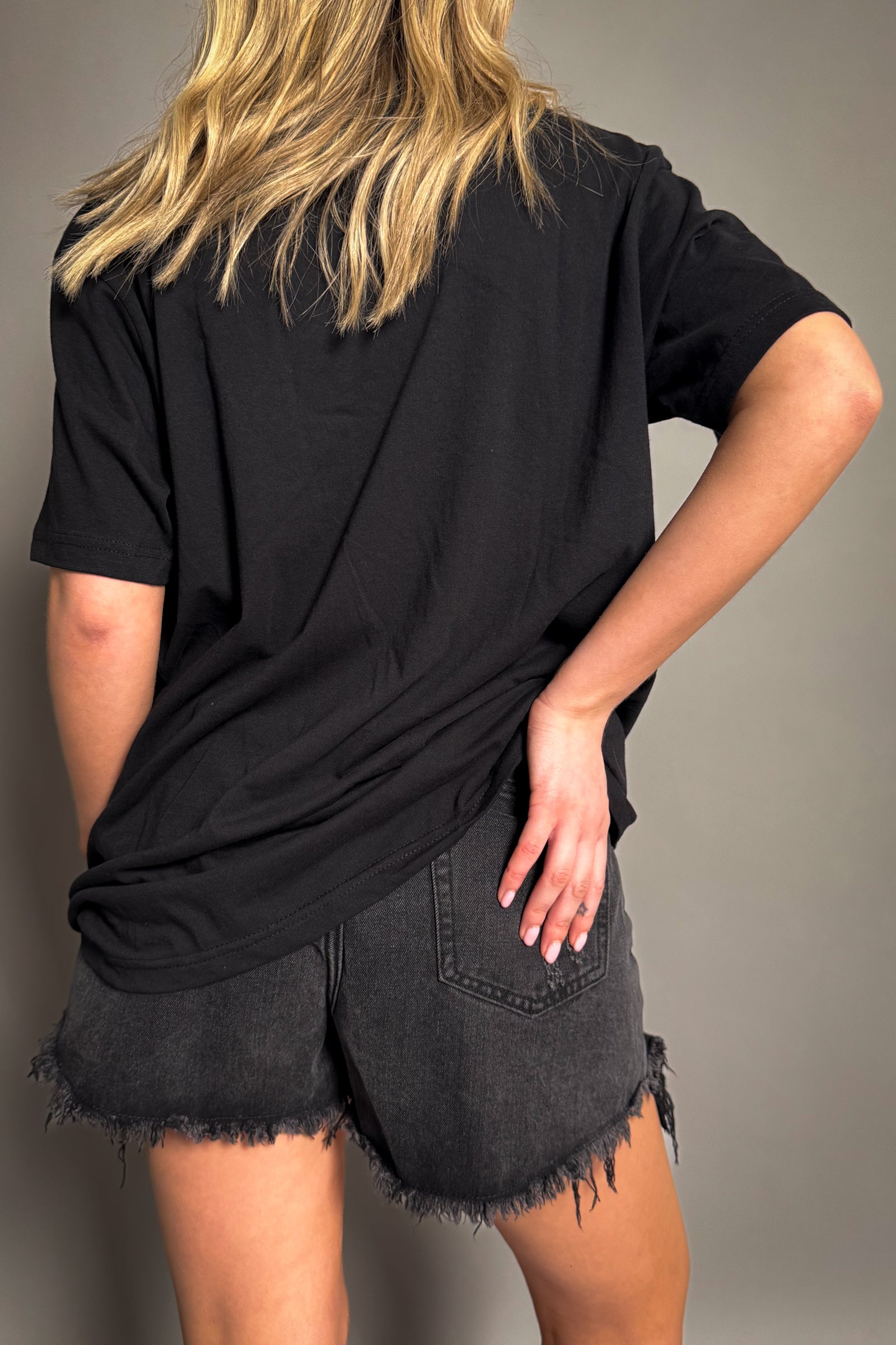 Back view of Little Lies Joan Jett and The Blackhearts black band tee with relaxed fit and classic short sleeve design