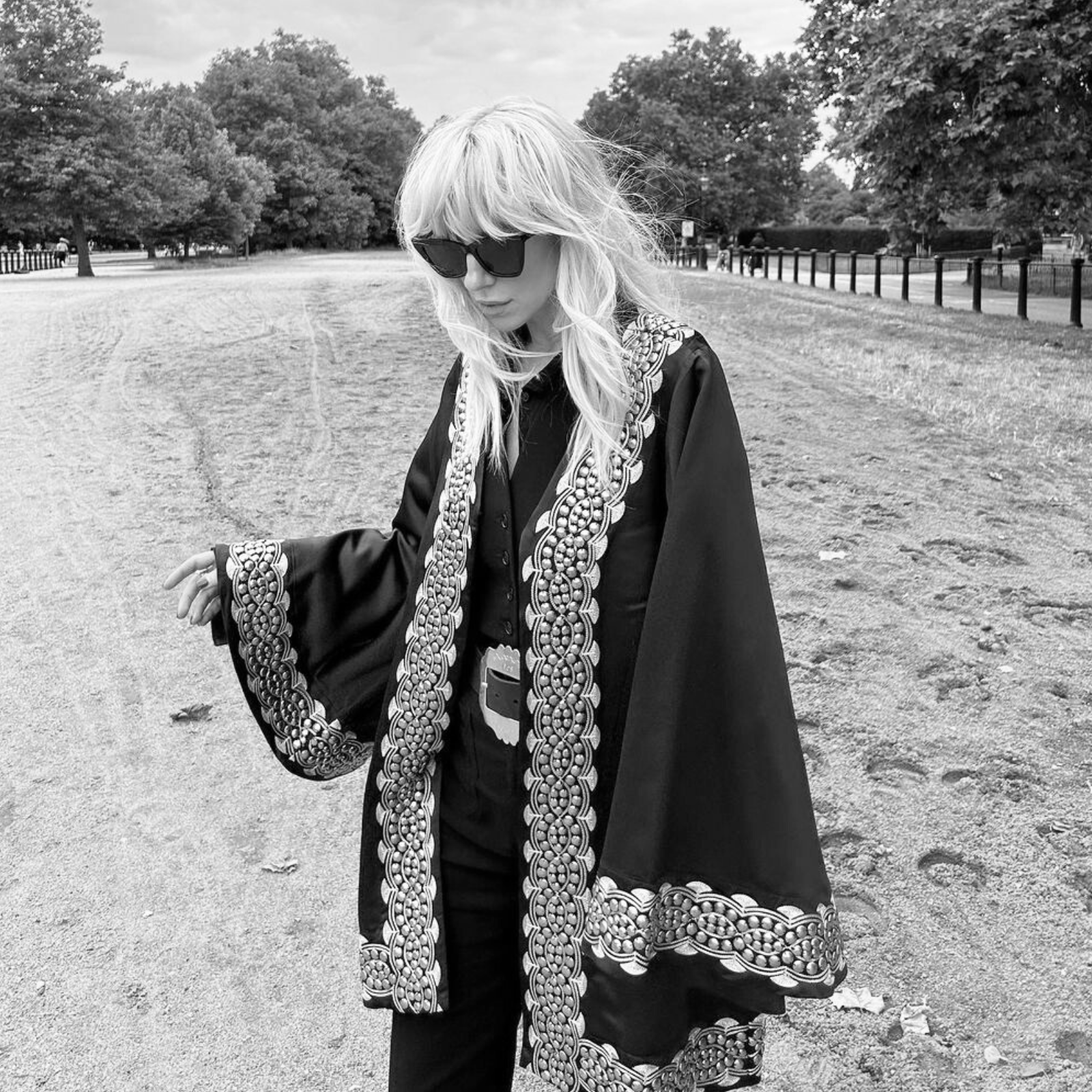 Model wearing the Kashmir embellished kimono at a hyde park concert. Festival style