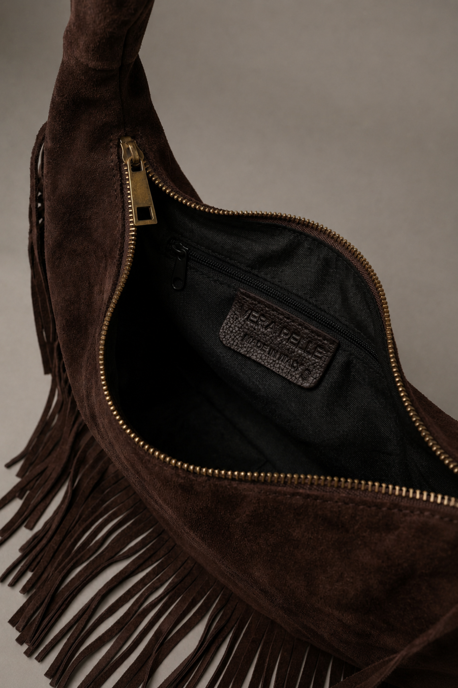 Little Lies Kate chocolate suede studded bag – inside view with zip compartment detail