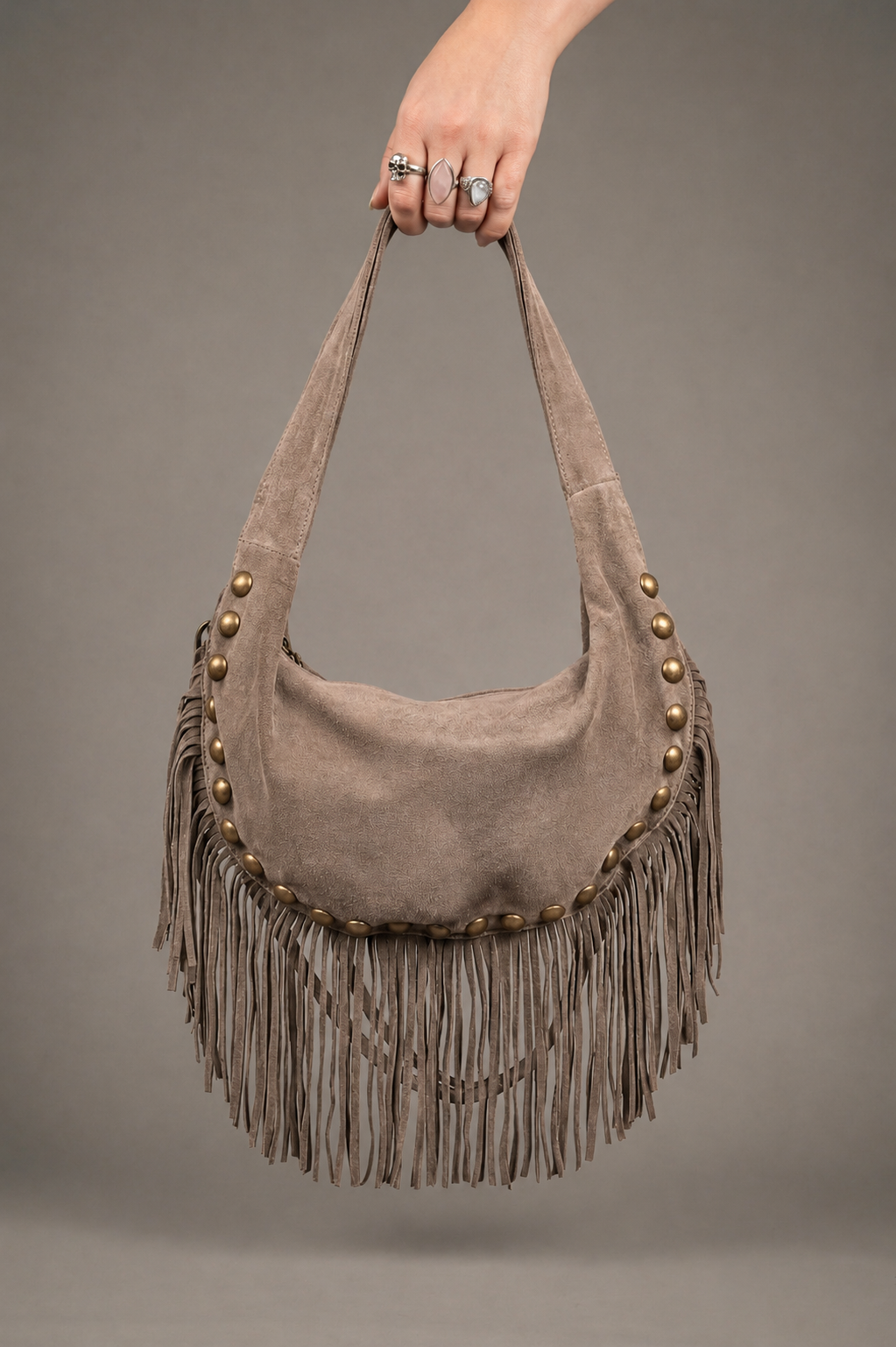 Little Lies Kate taupe genuine suede studded fringe bag, slouchy hobo style with tassel trim, handheld front view