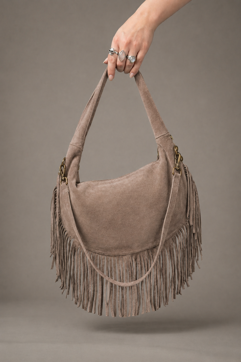 Little Lies Kate taupe genuine suede studded fringe bag, slouchy hobo style with tassel trim, handheld back view