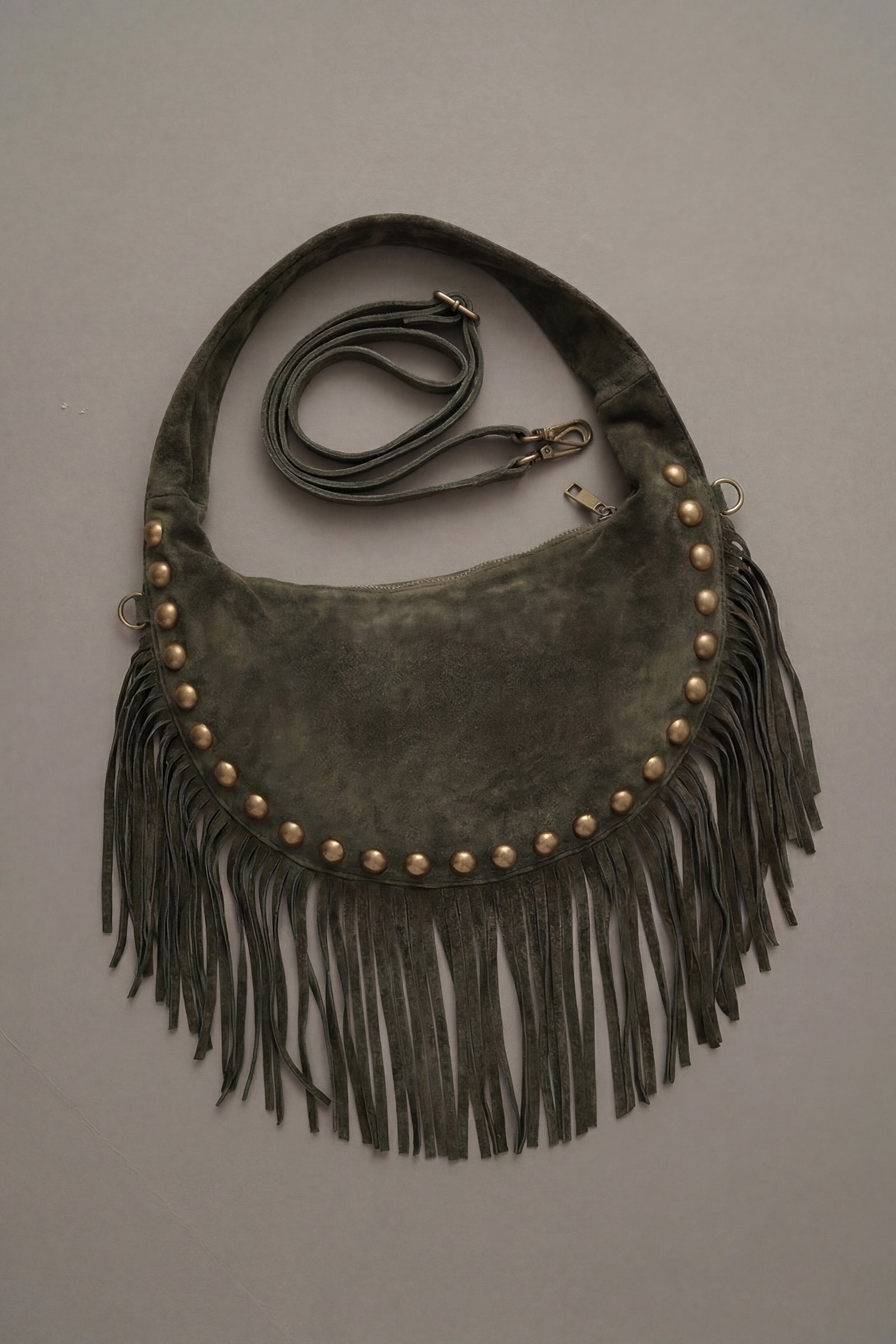 Little Lies Kate khaki genuine suede studded shoulder bag with fringe detail.