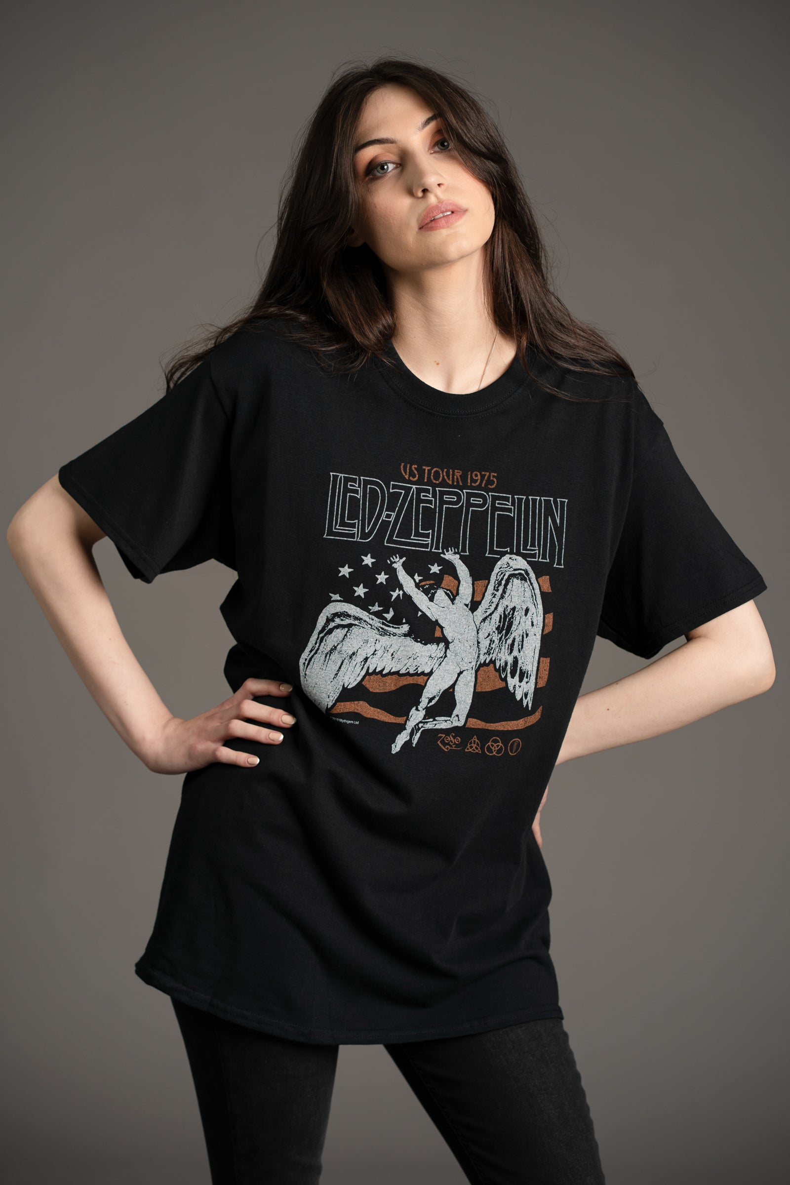 Model Andie wearing the Led Zeppelin 1975 Band graphic tee styled with Hendrix Denim flares from Little Lies