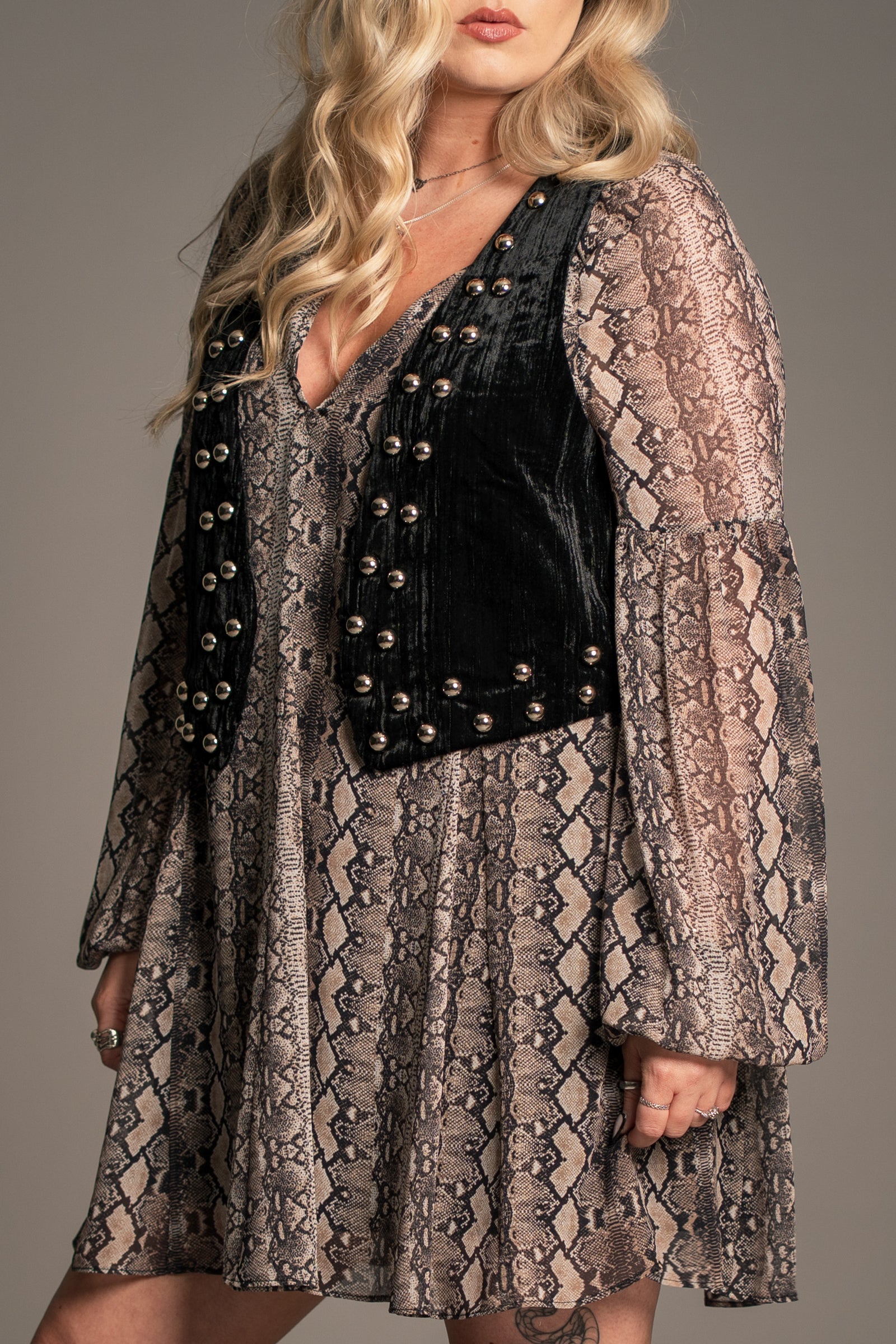 Close-up of Little Lies Lennon velvet waistcoat showing soft black textured fabric and silver stud embellishment