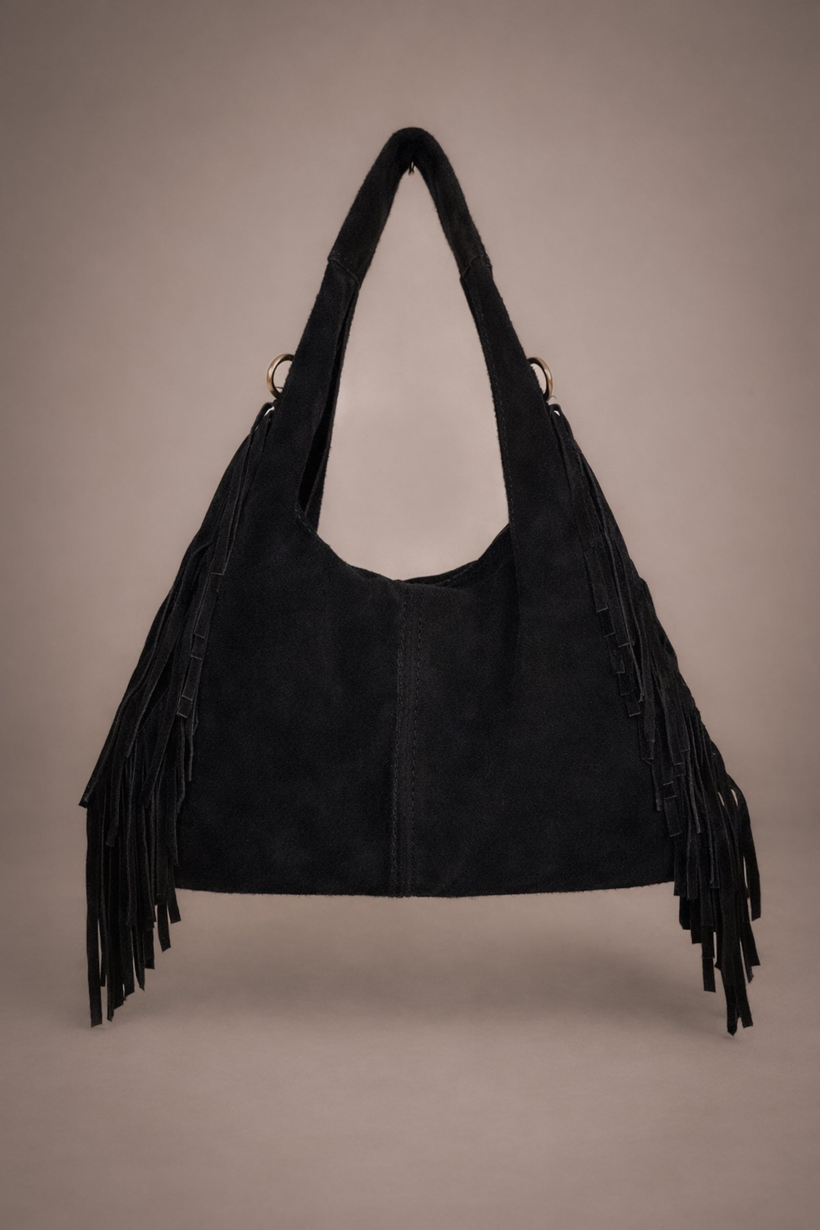 Little Lies Lila black genuine suede fringed grab bag front view in studio setting.
