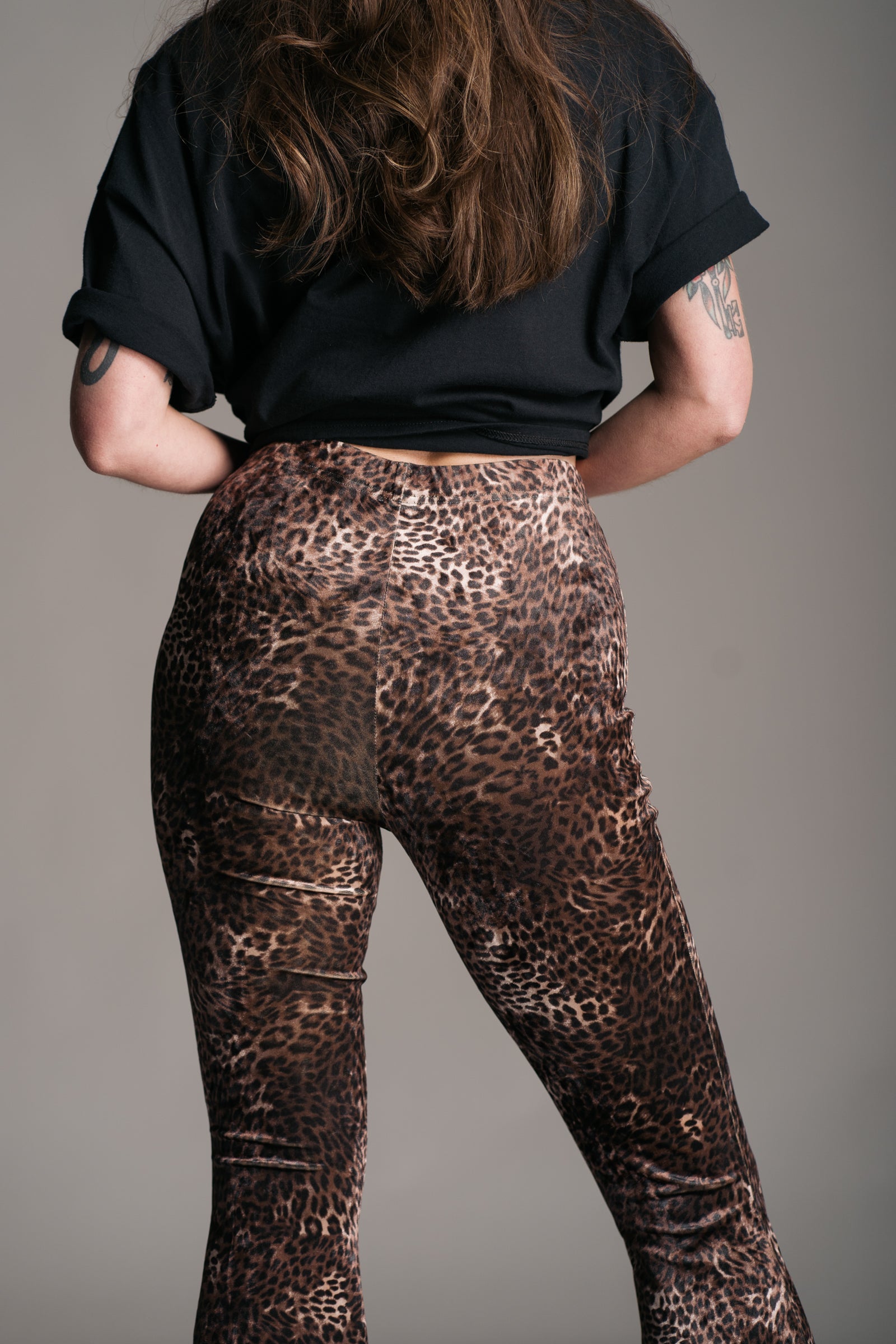 Little Lies Hendrix Leopard Velvet Flares worn with Led Zeppelin 1977 Tour Band Tee on Brunette model.