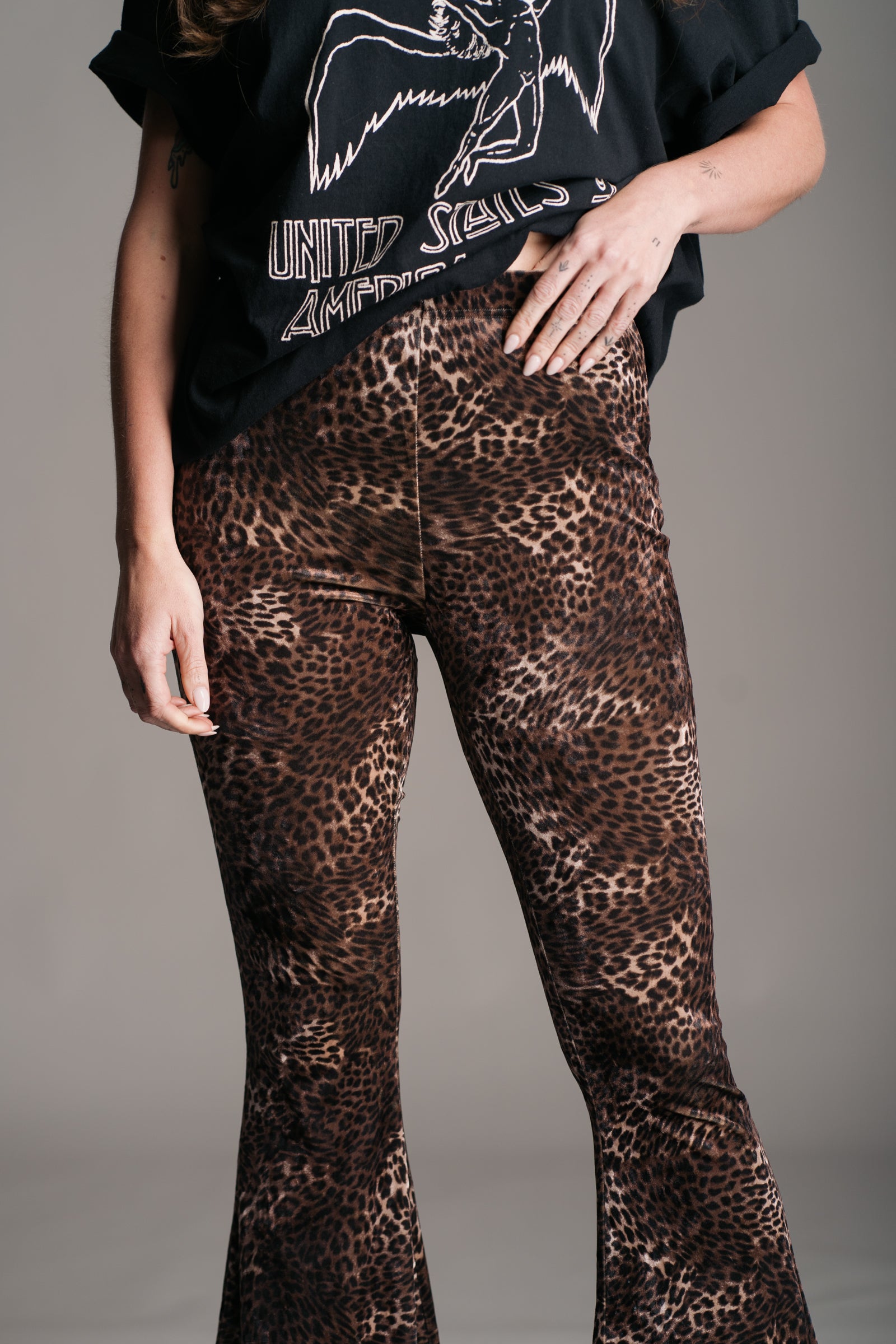 Little Lies Hendrix Leopard Velvet Flares worn with Led Zeppelin 1977 Tour Band Tee on Brunette model.