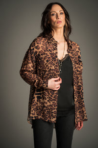 Victoria wears Little Lies Mosshart Leopard Chiffon Shirt in brown and black, lightweight sheer longline design styled over a black satin cami.