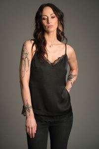 Victoria wears Little Lies Nightbird Lace Trim Cami Top in black, front view showing lace‑trim neckline and hem.
