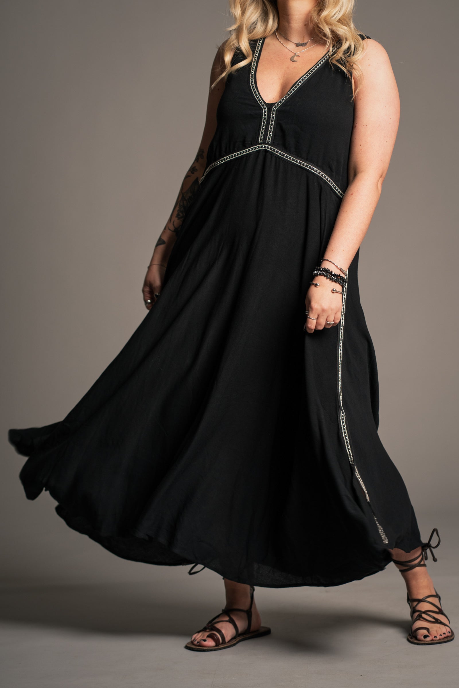 Onyx black cheesecloth midi dress with hidden pockets
