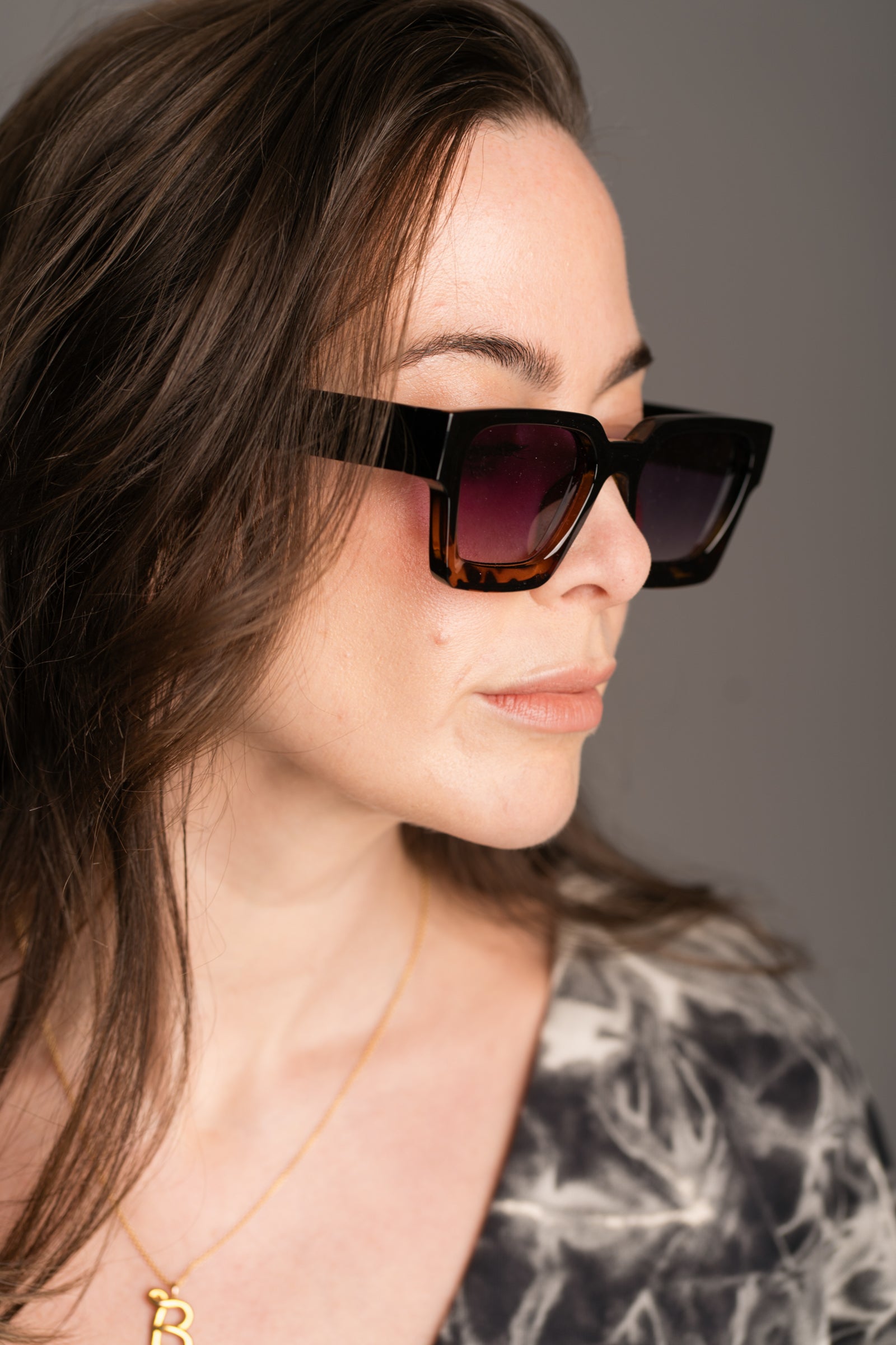 Chrissie Wayfarer Shades work by brunette model wearing the Nevermind Midi Tie Dye Dress