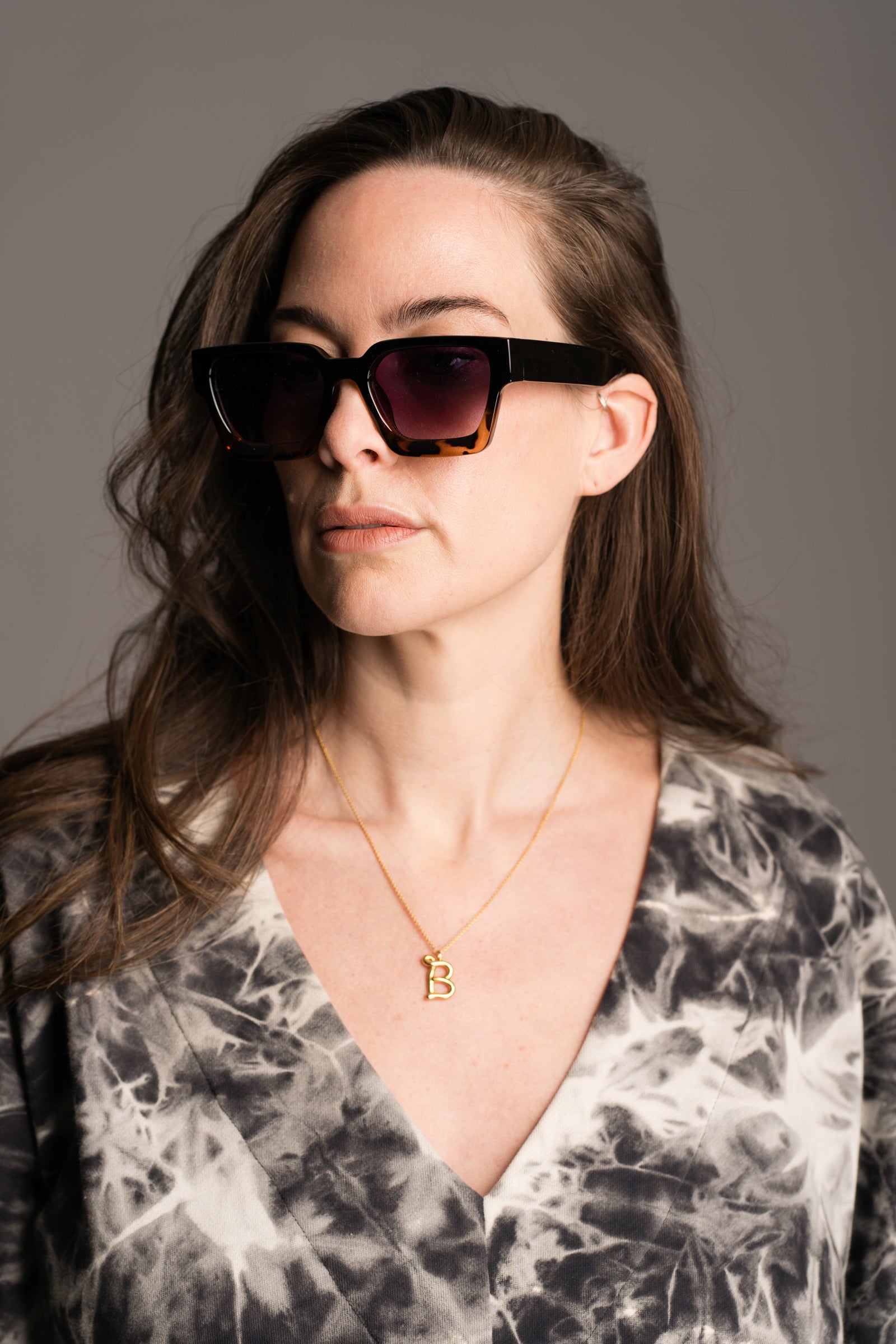 Chrissie Wayfarer Shades work by brunette model wearing the Nevermind Midi Tie Dye Dress