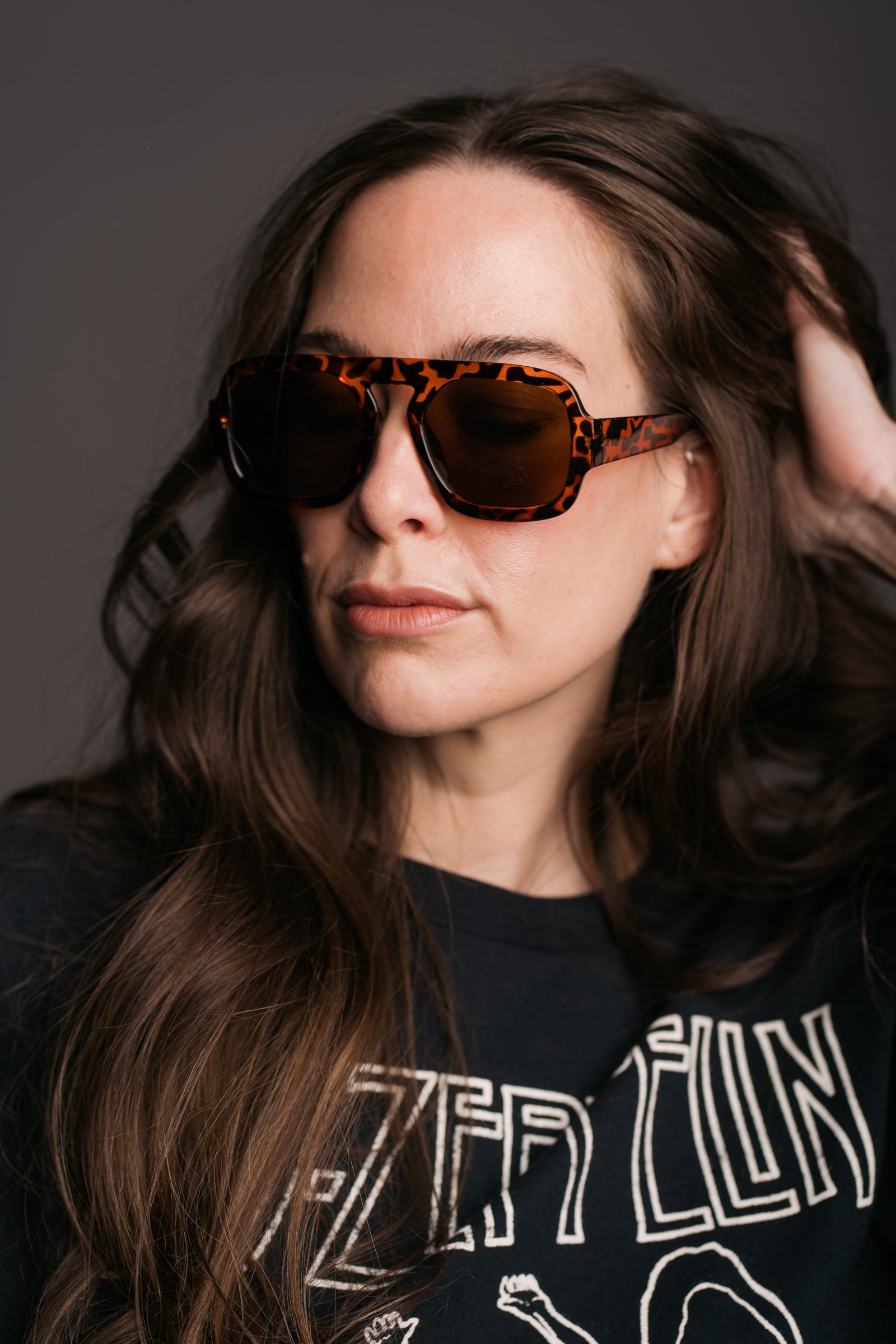 Lenny Tortoiseshell Aviator Shades worn by brunette model in Led Zeppelin Band Tee