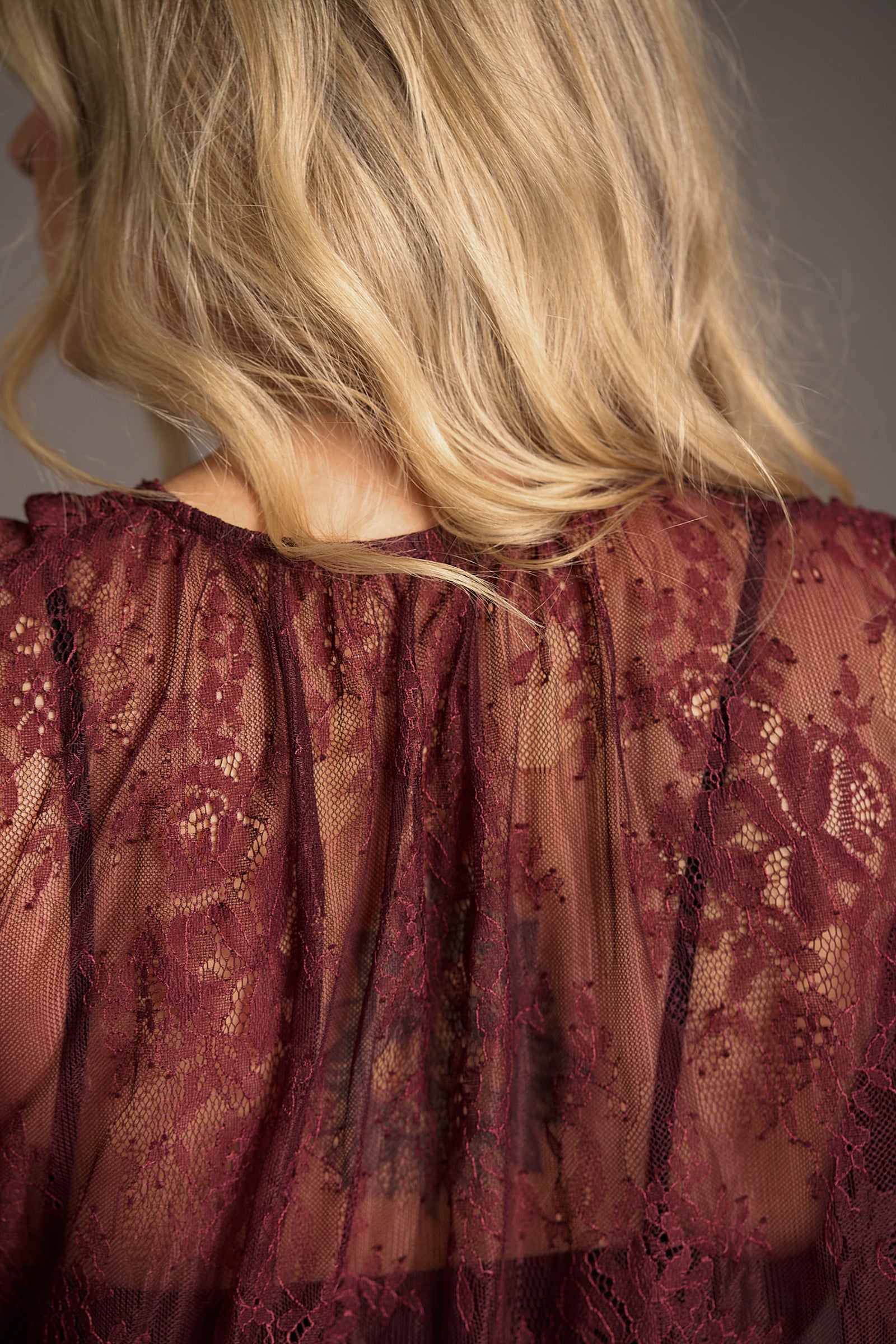 Close up of Rhiannon Burgundy Lace Smock Top, floral back detail