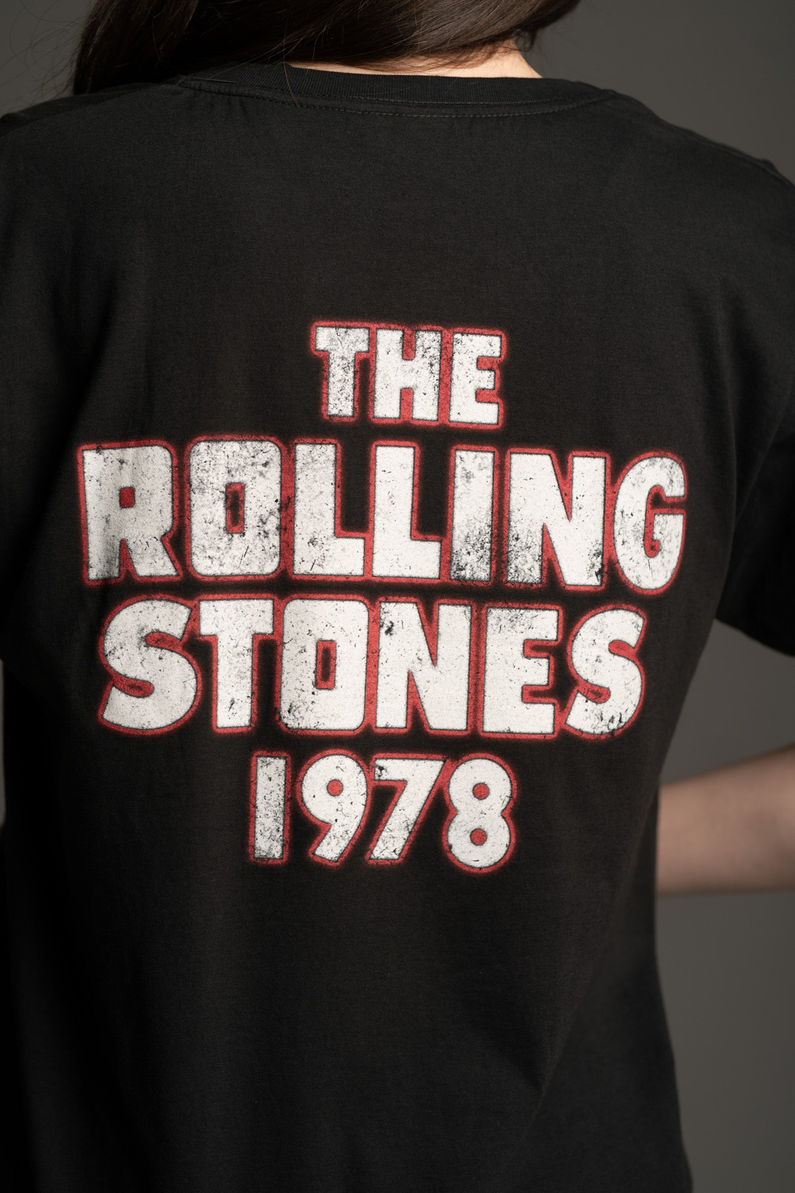 Close up of Little Lies Rolling Stones Dragon oversized black band-style t-shirt with Rolling Stones 1978 graphic on the back